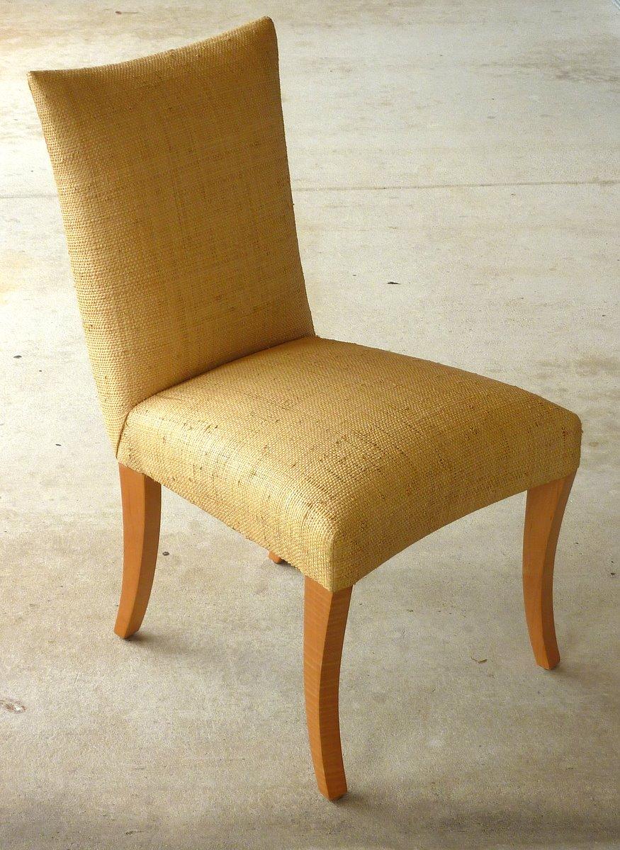 A set of four elegant dining chairs by John Hutton for Donghia -- a brand normally available only to interior designers and architects. Covered in exquisite Madagascar cloth.

A few important notes about all items available through this 1stdibs
