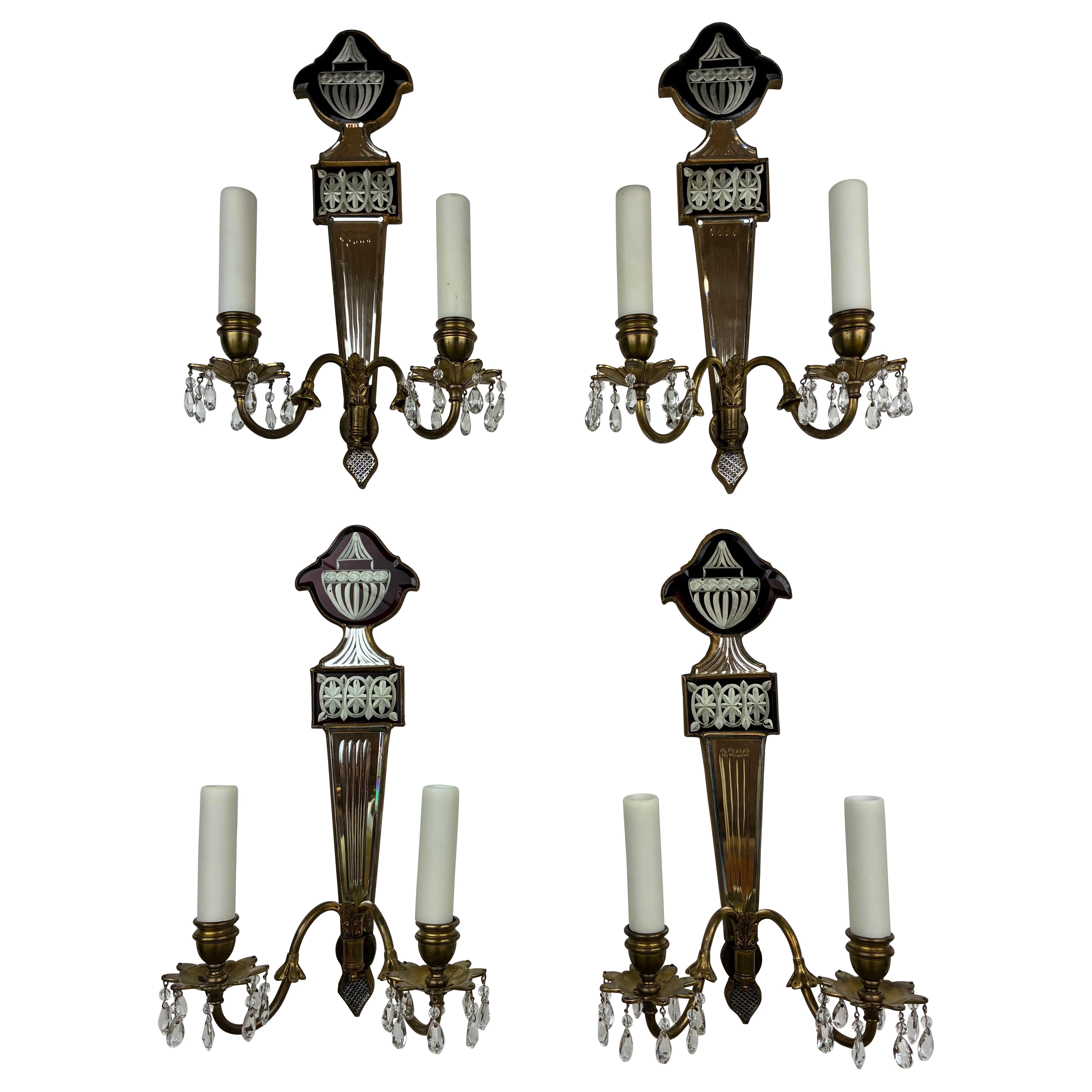 Set of Four Signed Caldwell Mirror Back Bronze Sconces with Ruby Glass Accents