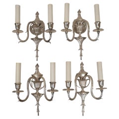 Set of Four Signed E. F. Caldwell Adam Style Silvered Bronze Sconces
