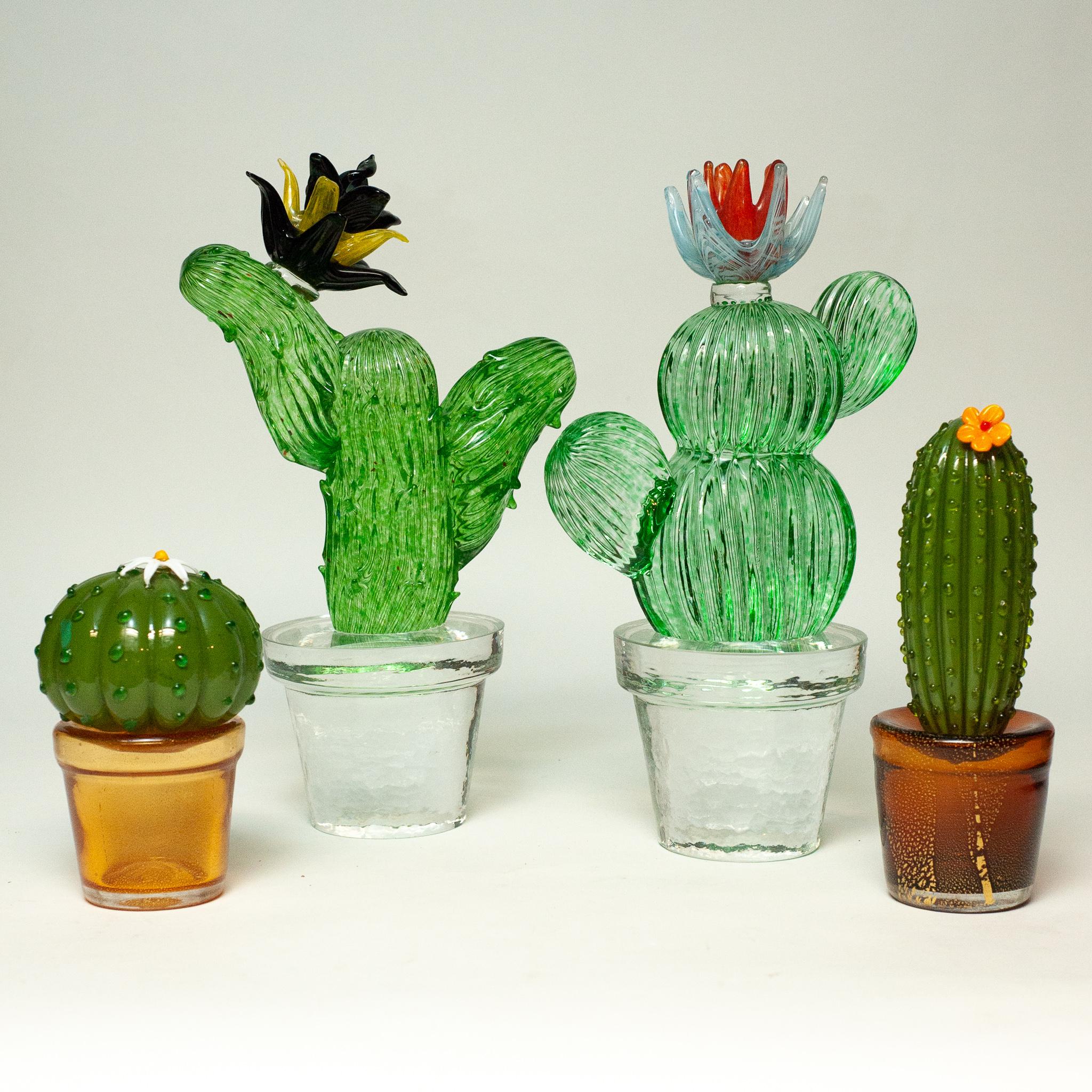 A stunning group of vintage signed Marta Marzotto murano glass cactuses circa 1990 just arrived at Maison Nurita. Entirely handblown in glass, these unusual and vibrant sculptures were made by the famed Italian fashion and jewelry designer. They are