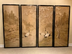Set of Four Silk Embroidered Asian Panels in Ebonized Black Lacquered Frames