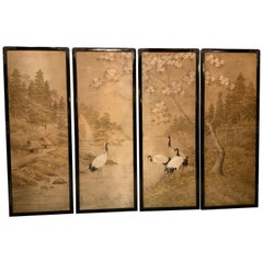 Set of Four Silk Embroidered Asian Panels in Ebonized Black Lacquered Frames