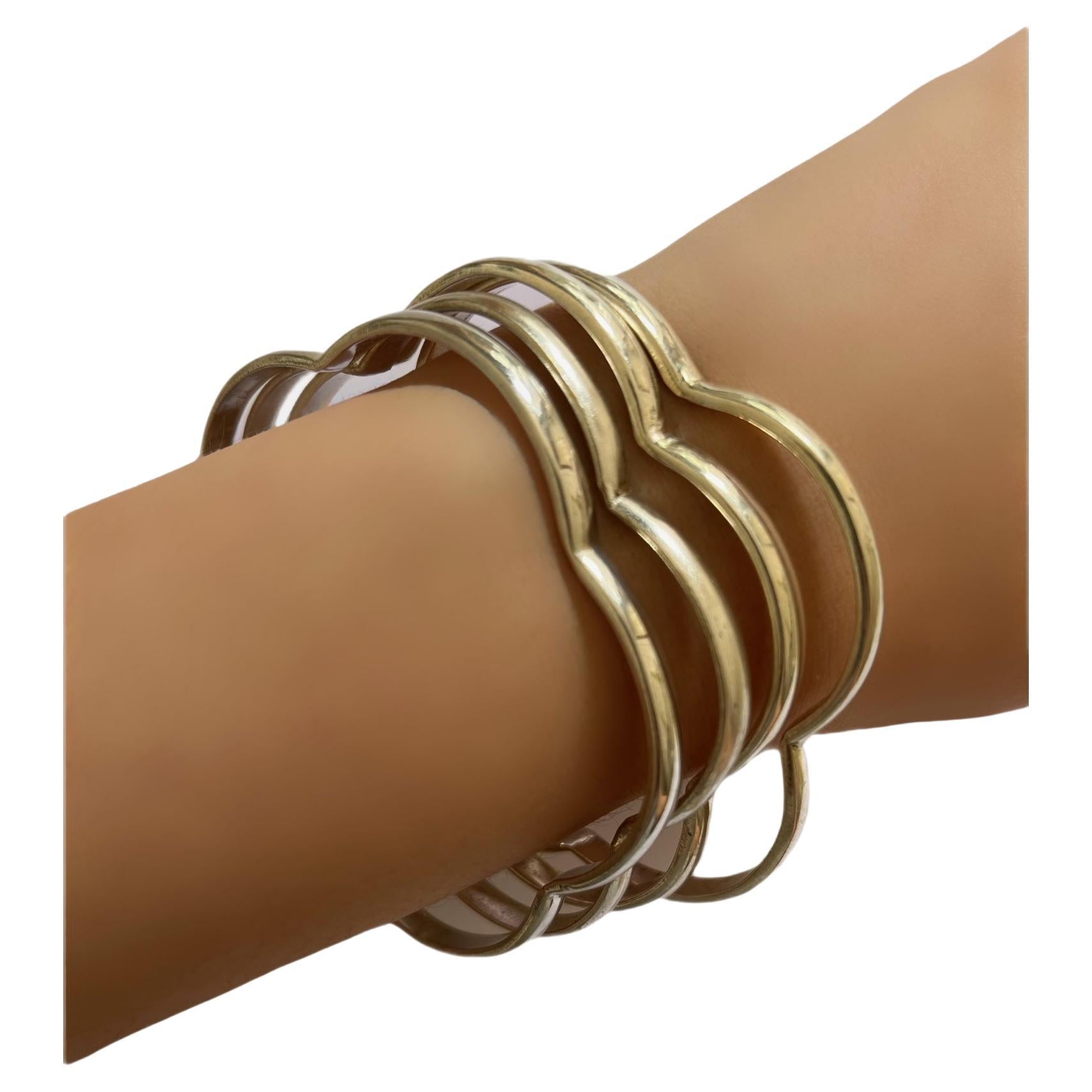 Set of Four Silver Flower Bangles For Sale