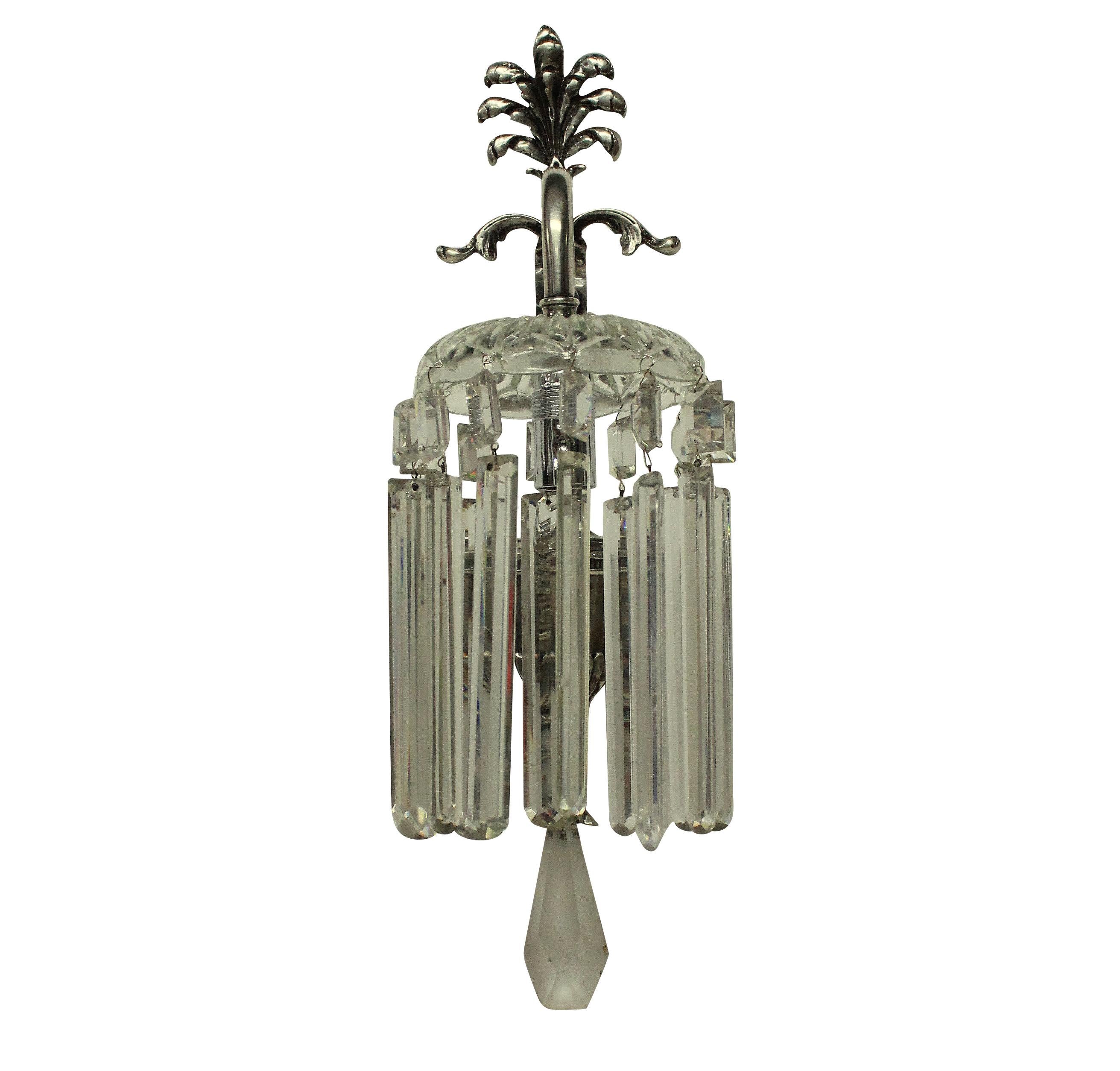 A set of four Edwardian Regency Revival silver plated wall sconces with cut-glass canopies and prism drops.
