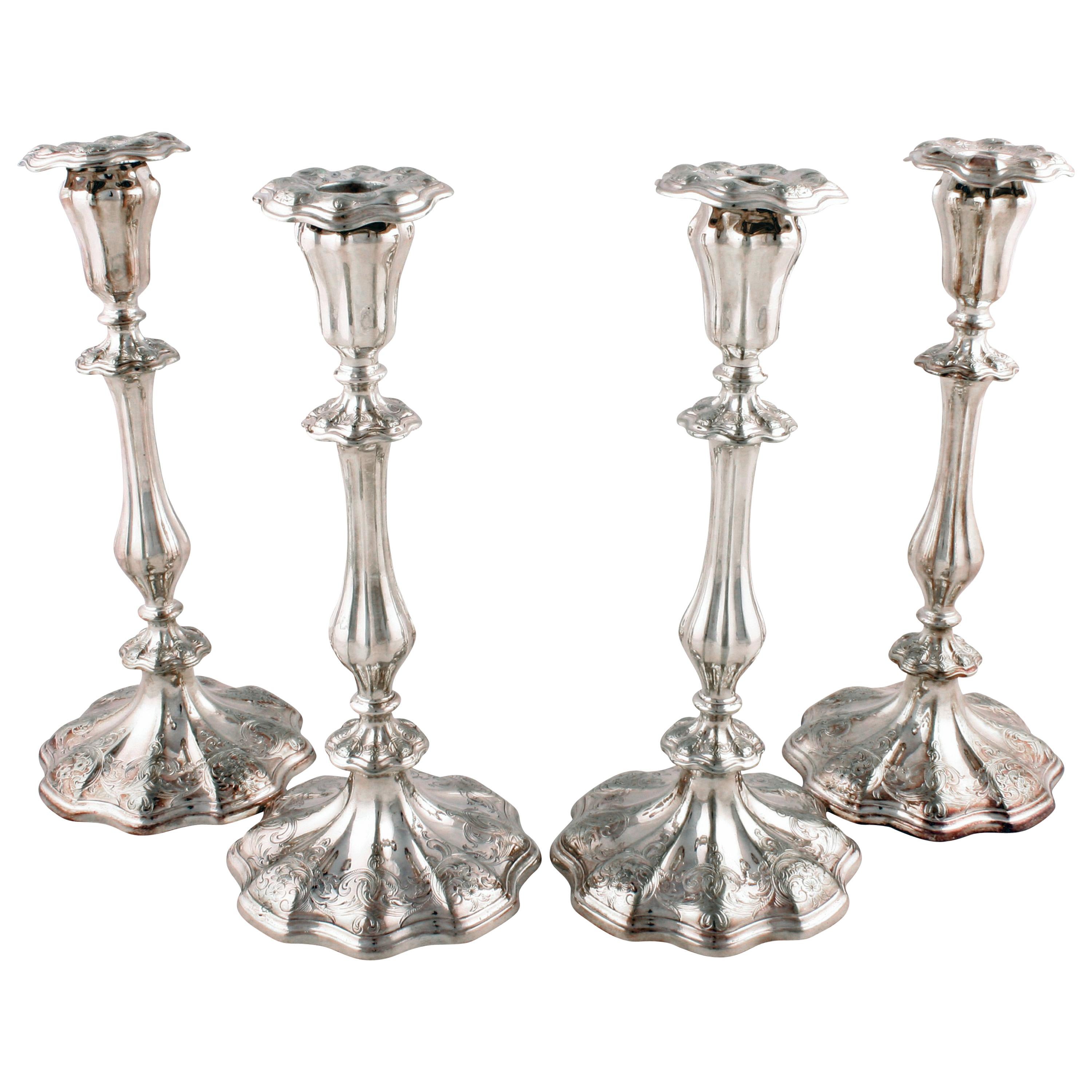 Set of Four Silver Plated Candlesticks For Sale