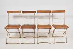 Set of Four Slatted Wood and Metal Folding Outdoor Garden Chairs