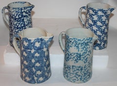 Set of Four Smoke Ring Sponge Ware Pitchers