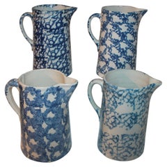 Set of Four Smoke Ring Sponge Ware Pitchers