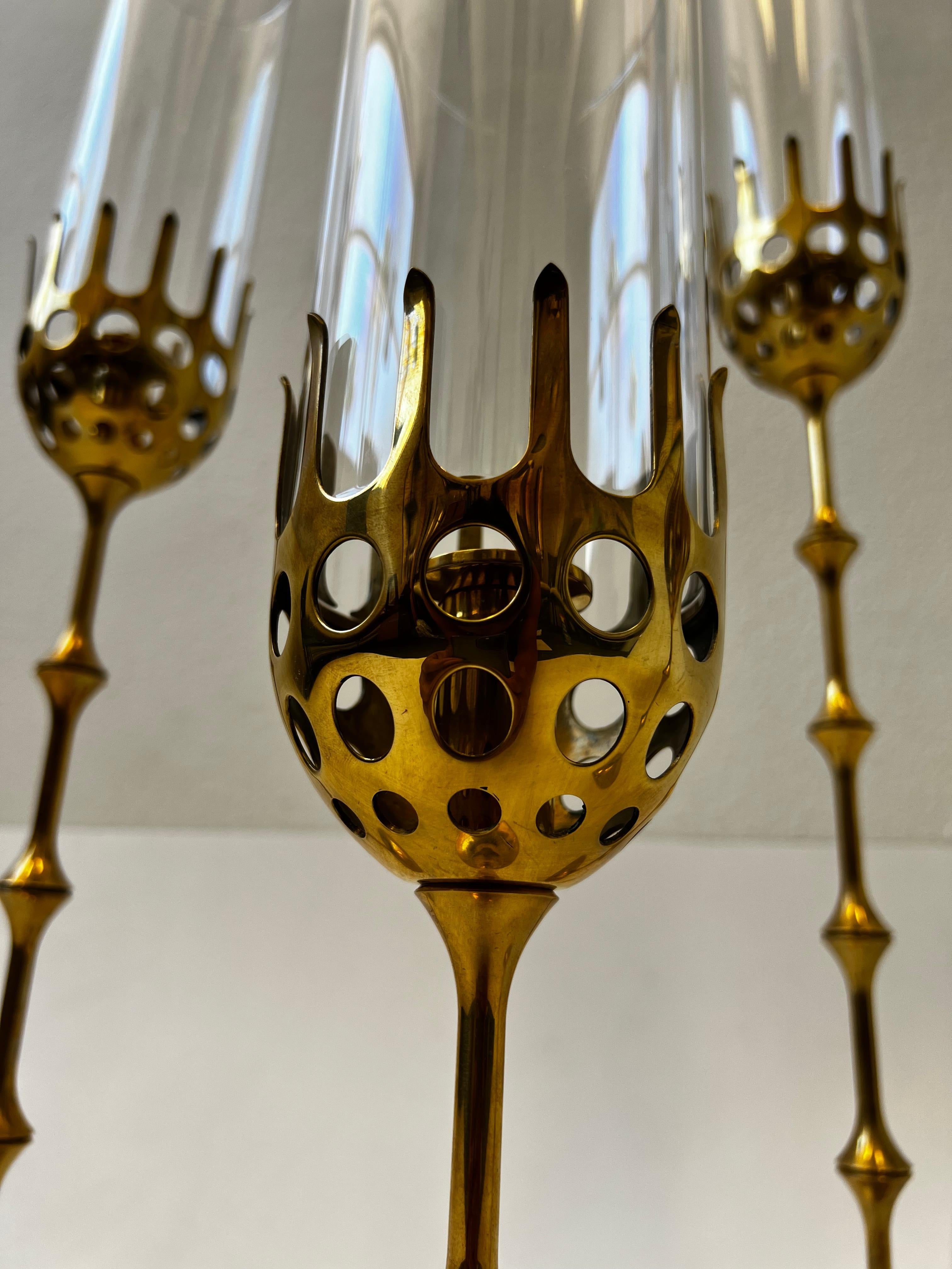 Polished Set of Four Solid Brass and Glass Hurricane Candles Holders by Bijørn Wiinblad  For Sale