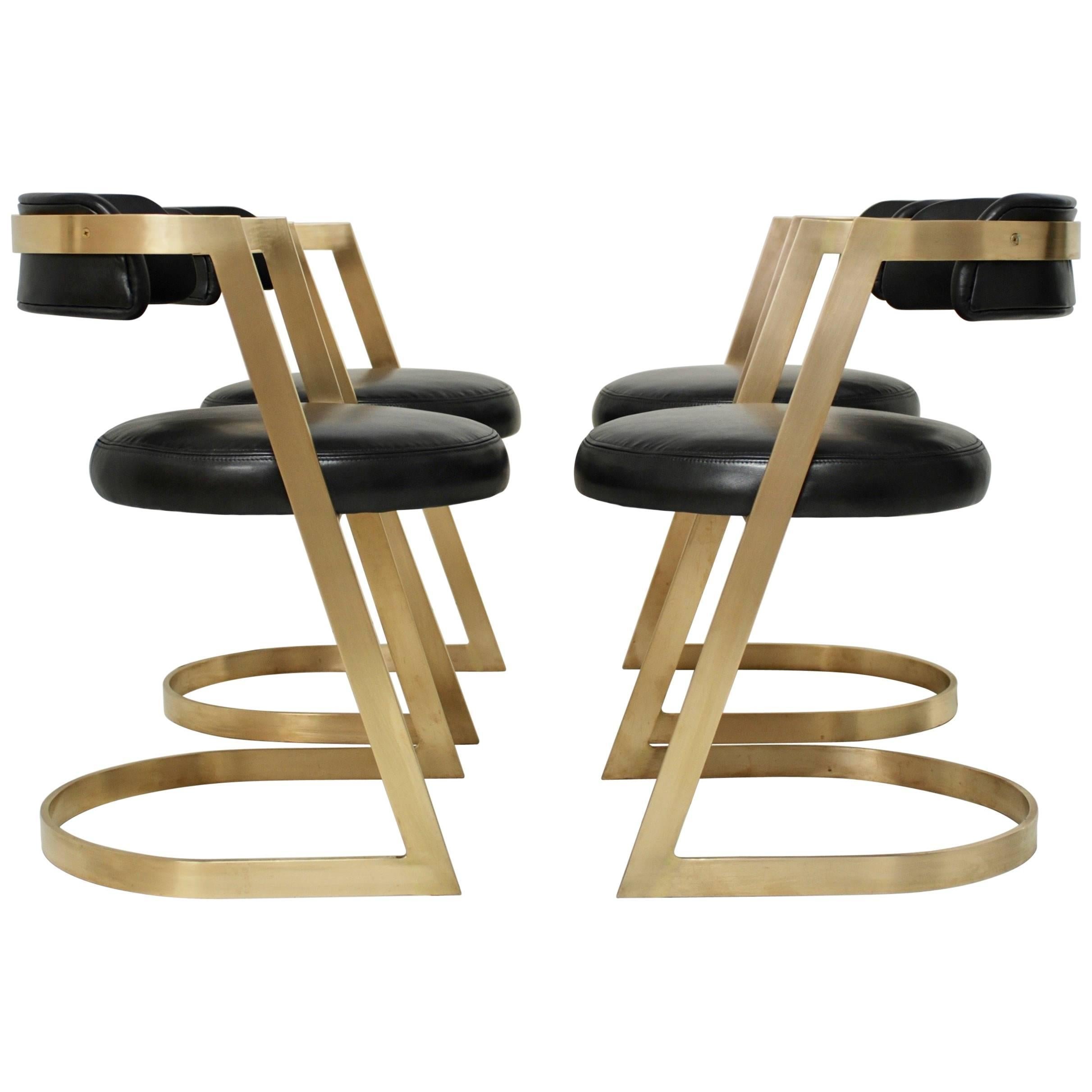 Set of Four Solid Brushed Brass Cantilevered Dining Chairs