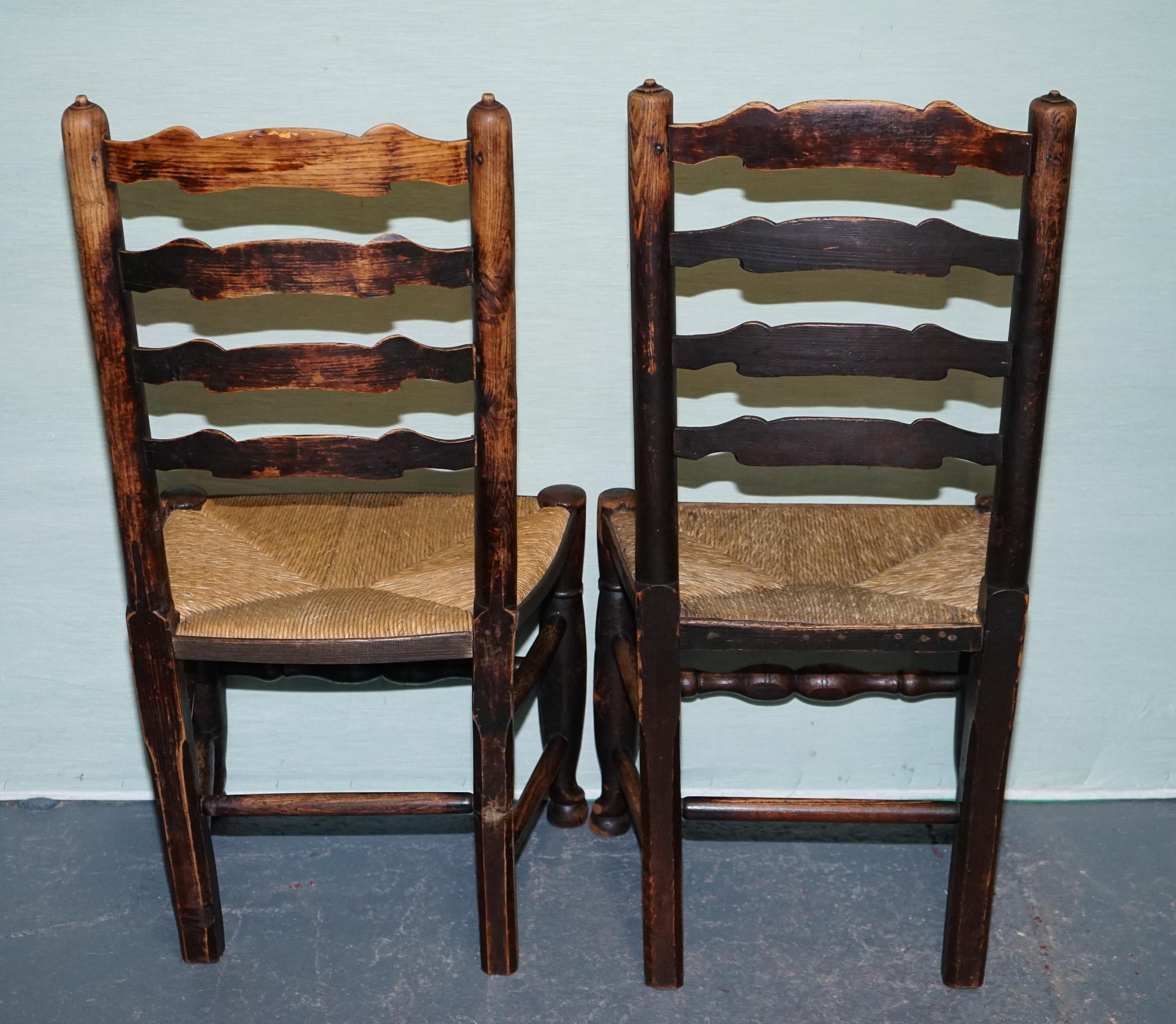 
Antiques of London



A charming set of four vintage country house dining chairs, crafted in solid oak with traditional ladder back design and rush straw seats.

These chairs exude rustic farmhouse character, featuring shaped back slats, turned