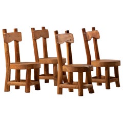 Set di quattro sedie da pranzo in legno massello in stile brutalista, Francia, anni ’60