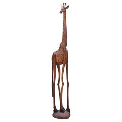 Set of Four South African Hand-Carved Giraffe Sculptures in a Variety of Sizes
