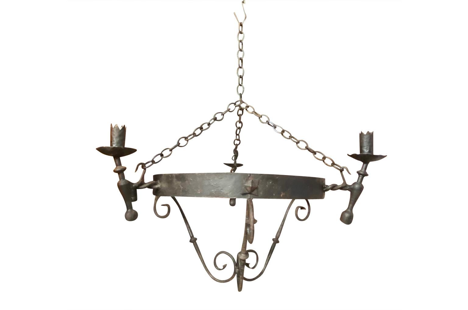 Set of Four Spanish Iron Chandeliers 1