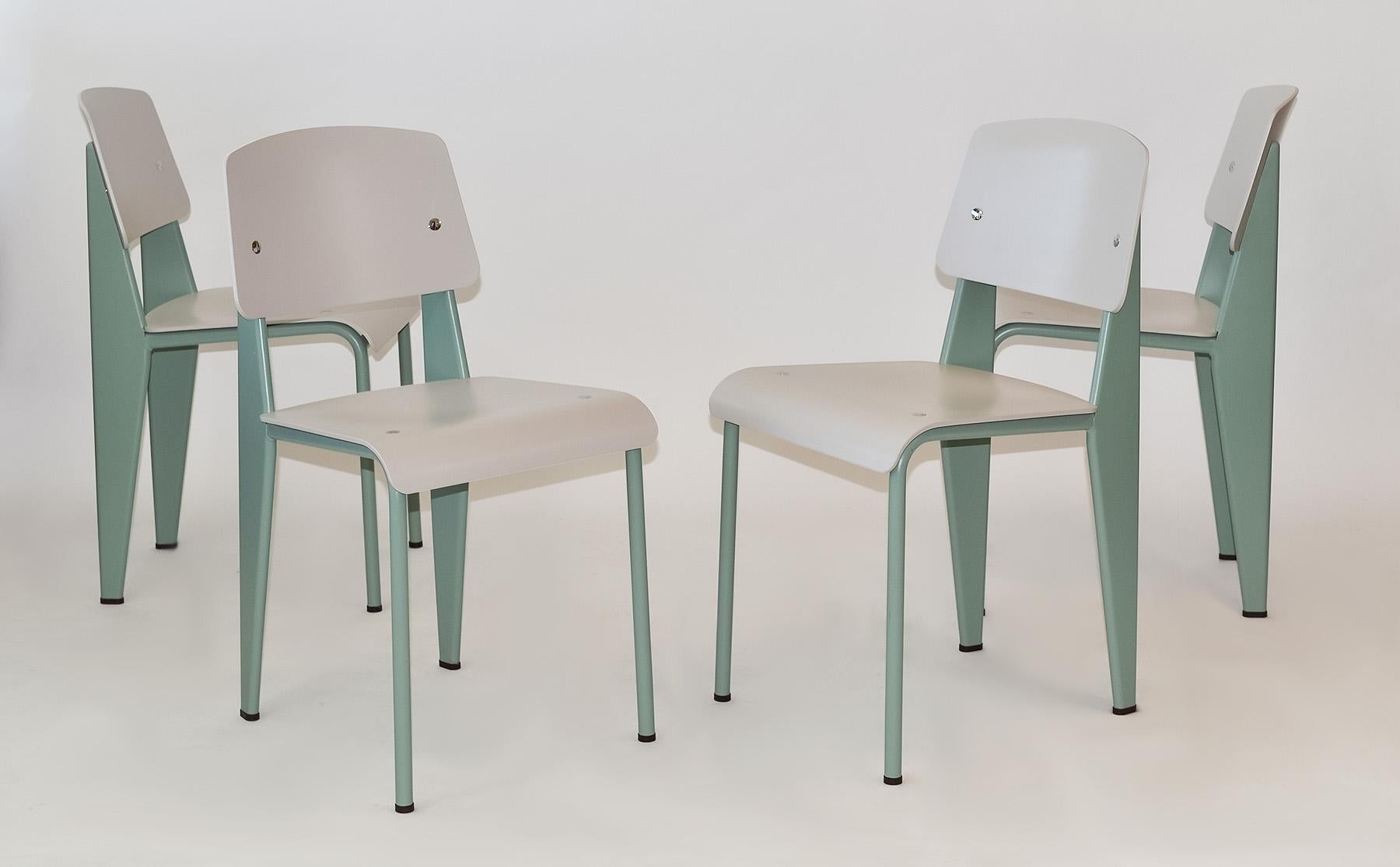 Set of Four Standard SP Chairs by Jean Prouvé from Vitra

This set of four SP (Siege en Plastique) chairs feature vert-colored powder-coated sheet and tubular steel frames with a gray-colored seat and backrest made of robust ASA plastic in a fine
