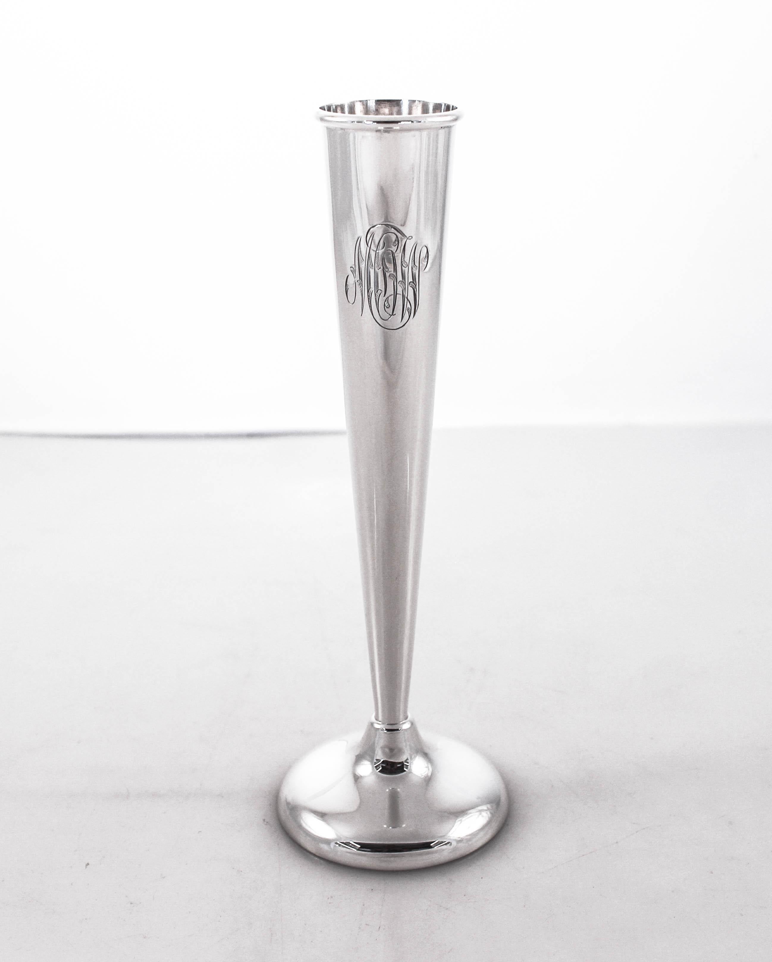 We are thrilled to offer the unique set of four sterling silver bud vases. Each one has been meticulously restored to their original pristine condition; no scratches, dents, dings or tarnish. These four beauties are ready to grace your home. Sleek