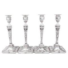 Set of Four Sterling Silver English Candlesticks