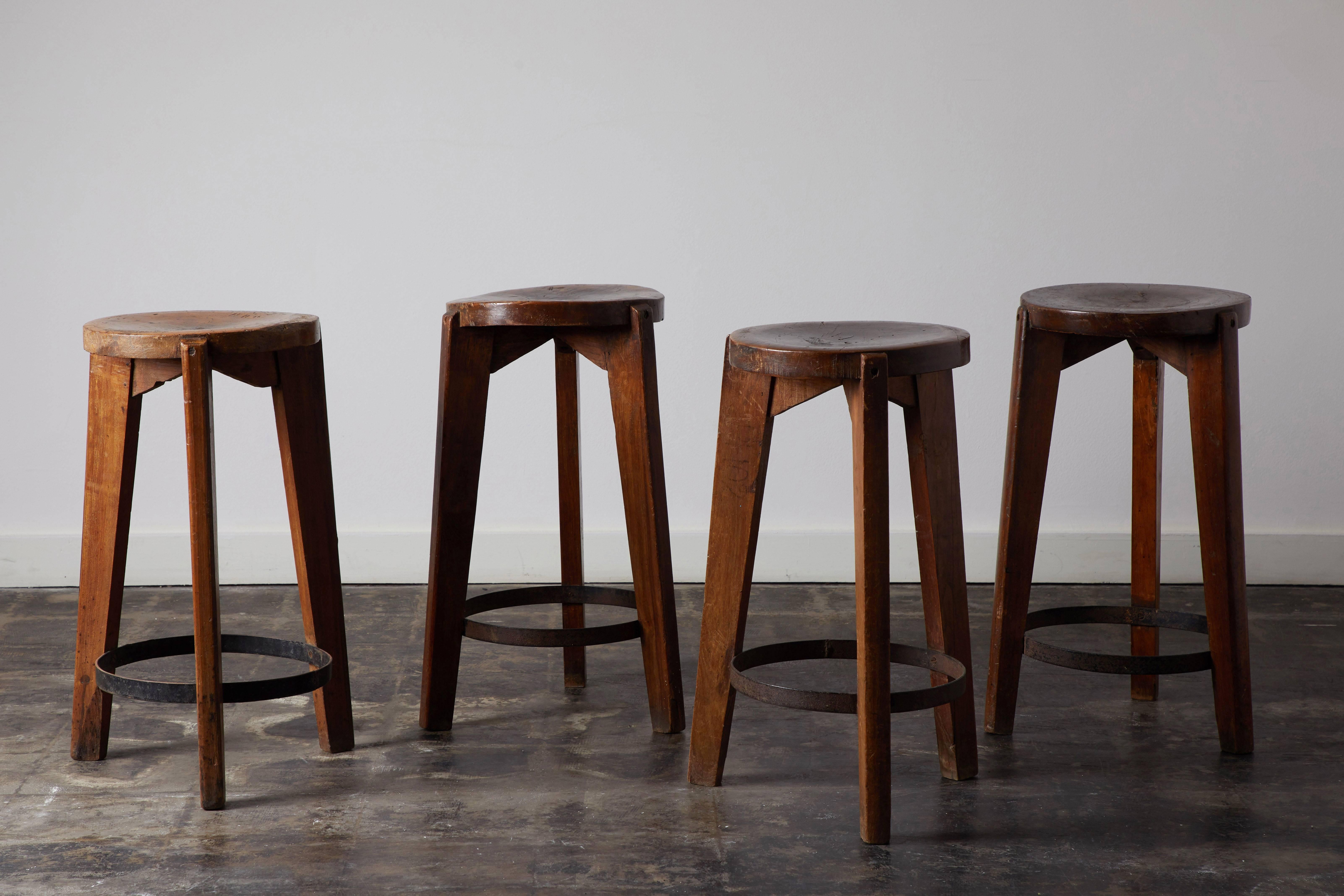 Set of four teak and steel stools by Pierre Jeanneret for Punjab University in Chandigarh. Made in France/India, circa 1965.

 