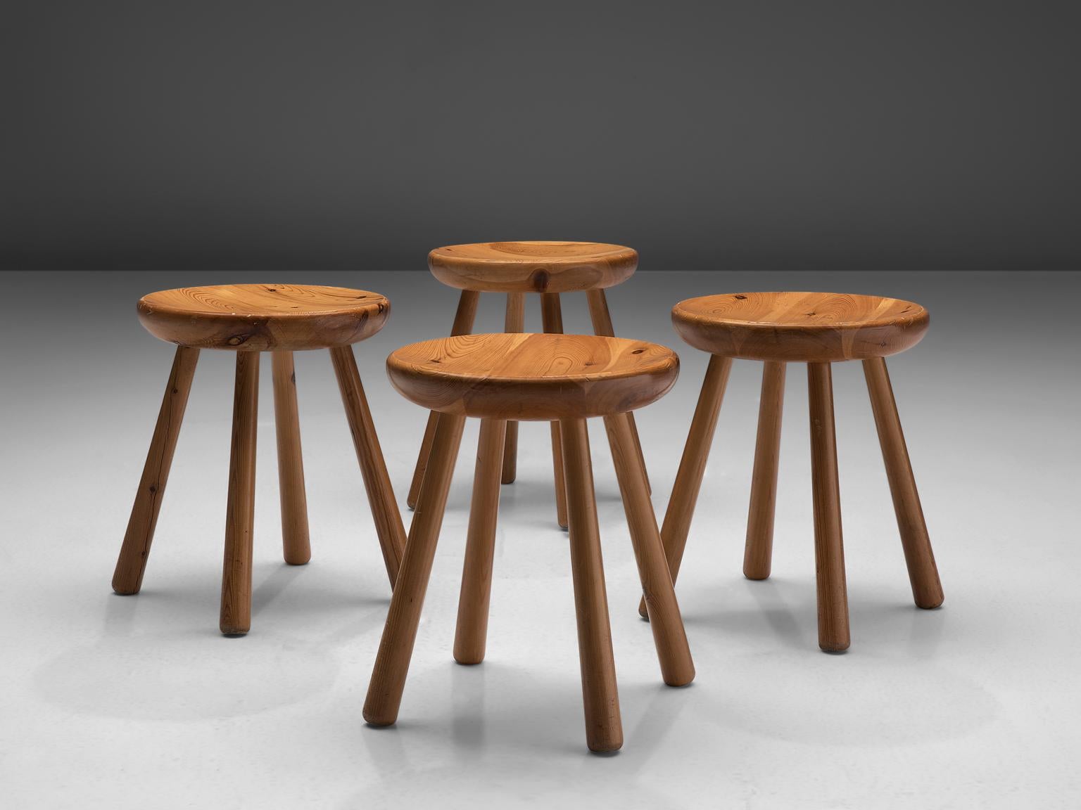 Stools, in pine, Europe, 1970s. 

Set of two stools in solid pine in different sizes. They are modest, raw and functional. A simplistic design which shows the nice and expressive grain of the pine wood. These chairs show great resemblance to the