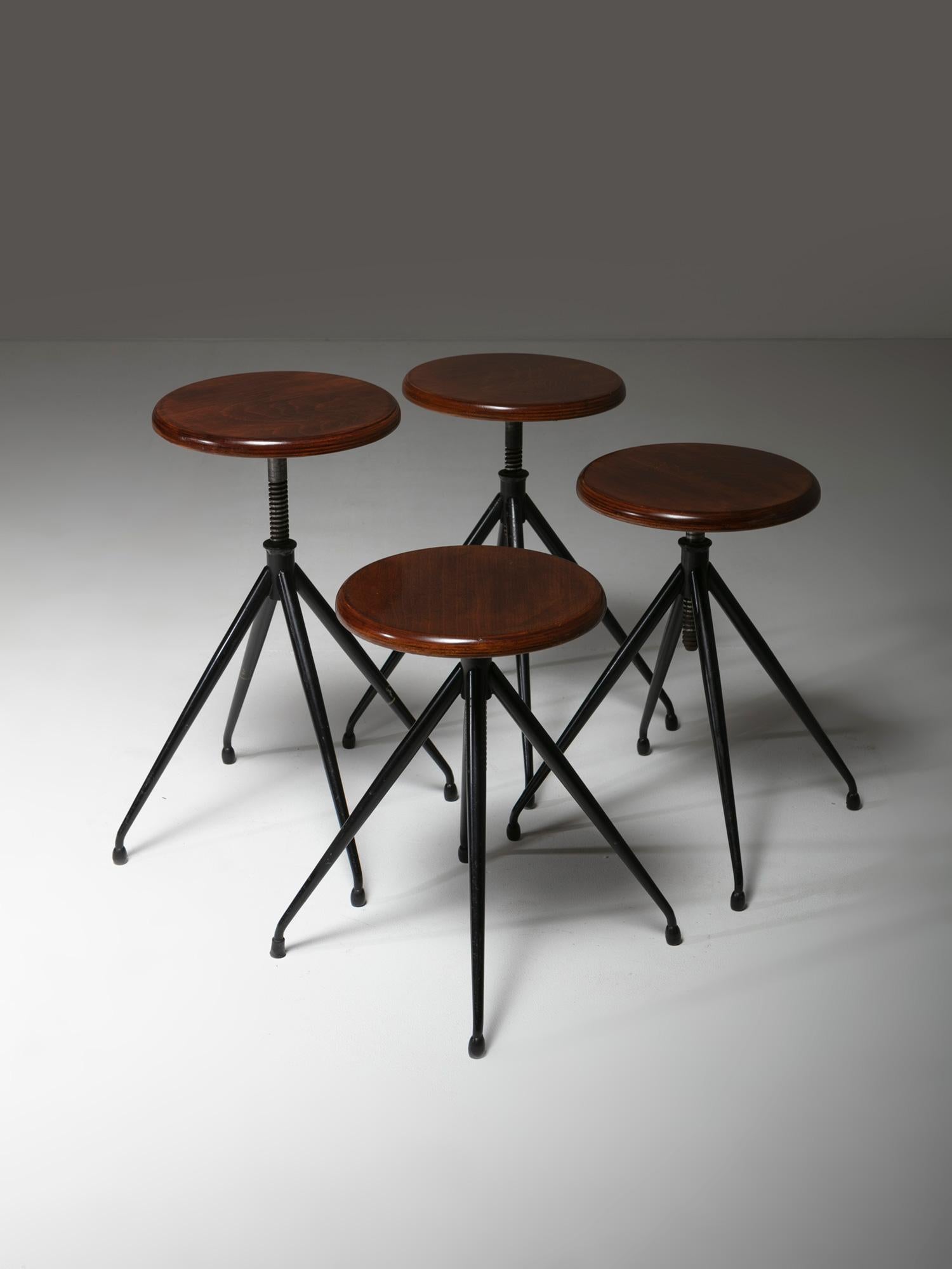 Four black lacquered stools by Gastone Rinaldi for RIMA.
Adjustable version with adjustable polished plywood seat.