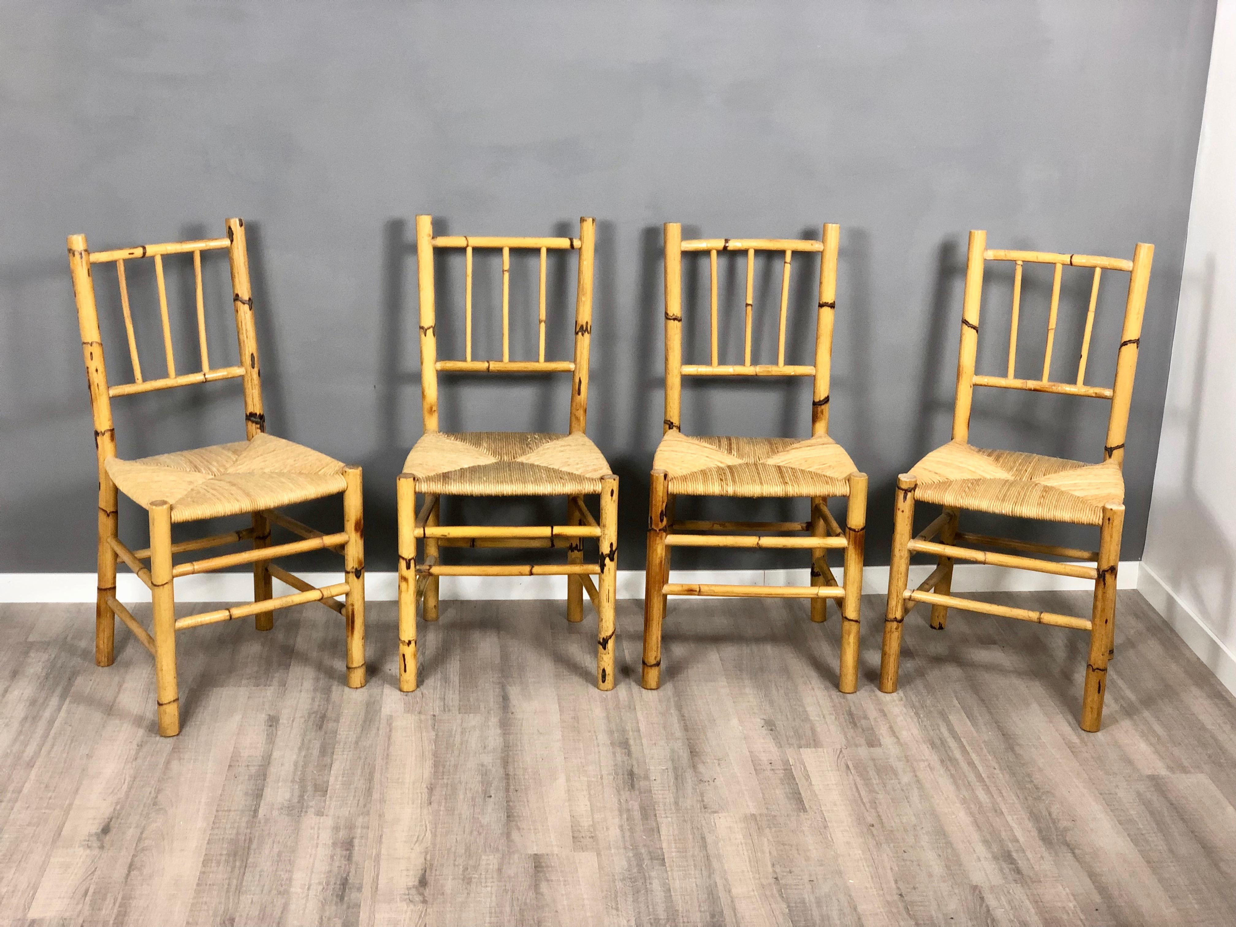 Ensemble de quatre chaises vintage en paille et bambou, Italie, vers 1960.
  