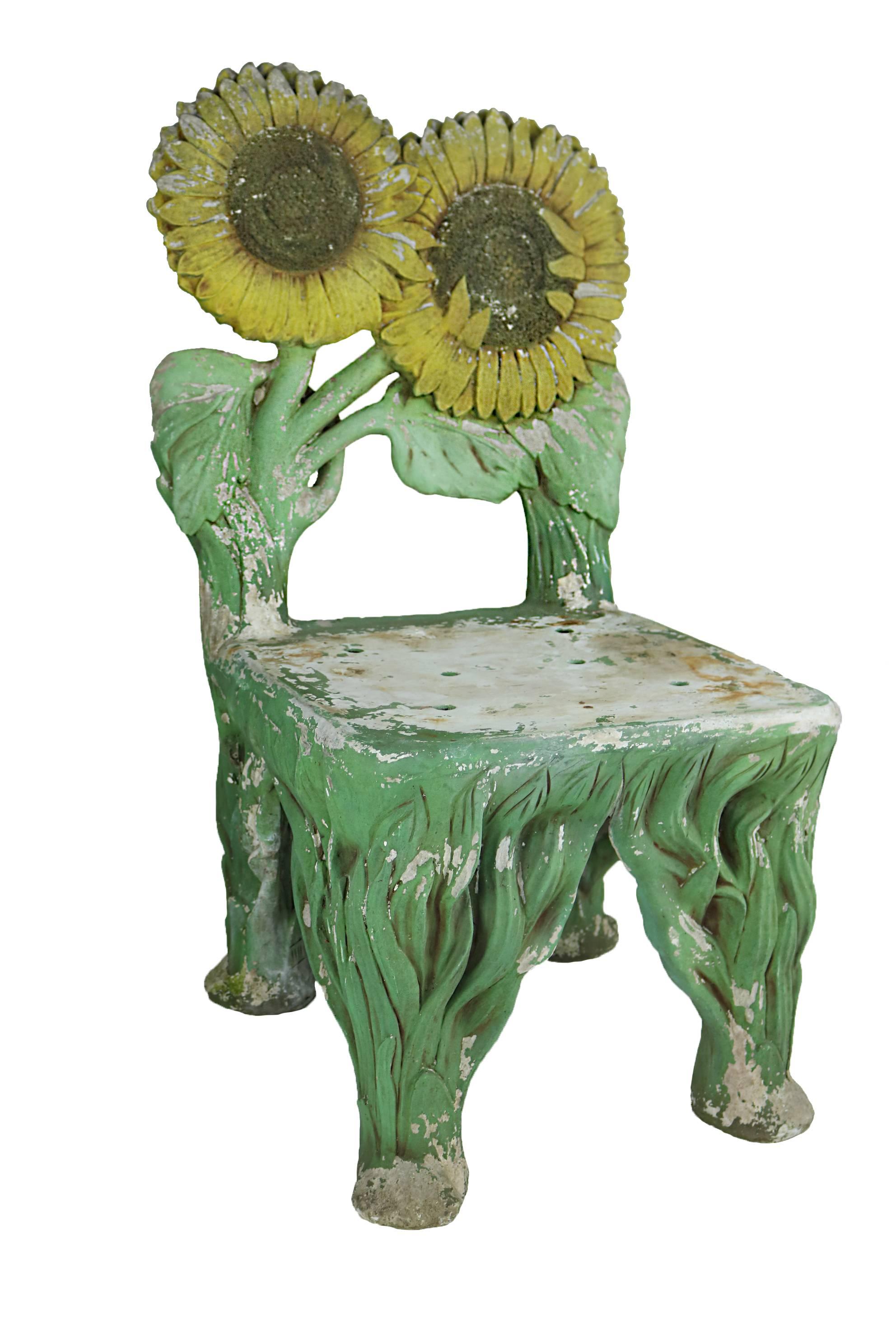 Whimsical set of four sunflower chairs constructed from fibre glass with faux stone and painted decoration.

 Late 20th century these chairs echo grotto chairs of the 19th century.