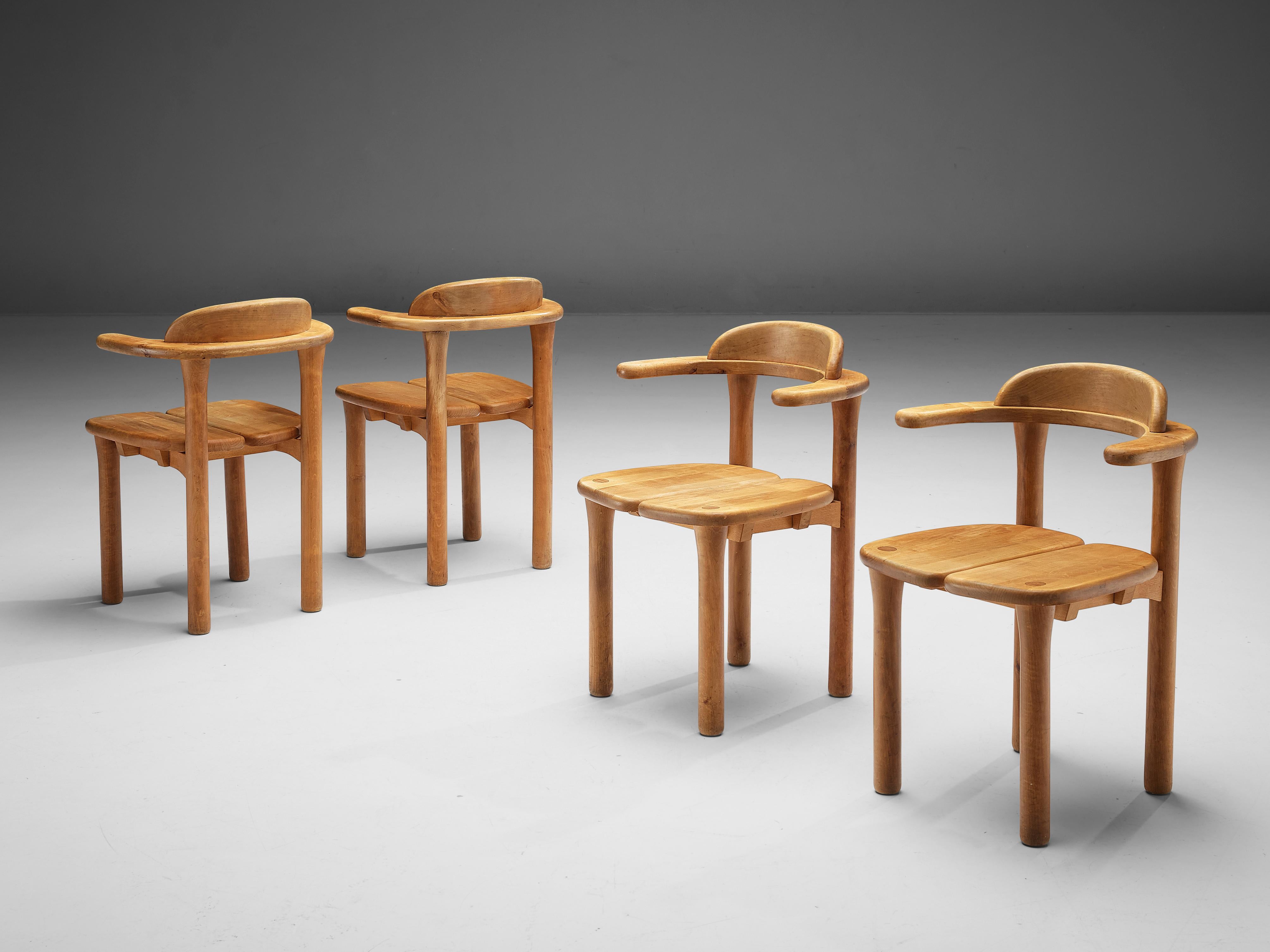 Dining chairs, birch, Sweden, circa 1960s

This set of four chairs in birch features a sturdy back with short armrests. The seating consists of two slats and is detailed with wood-joints. Due the composition of different elements these chairs get a