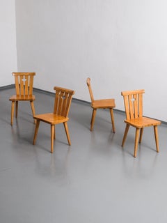 Set of Four Swedish Midcentury Pine Dining Chairs