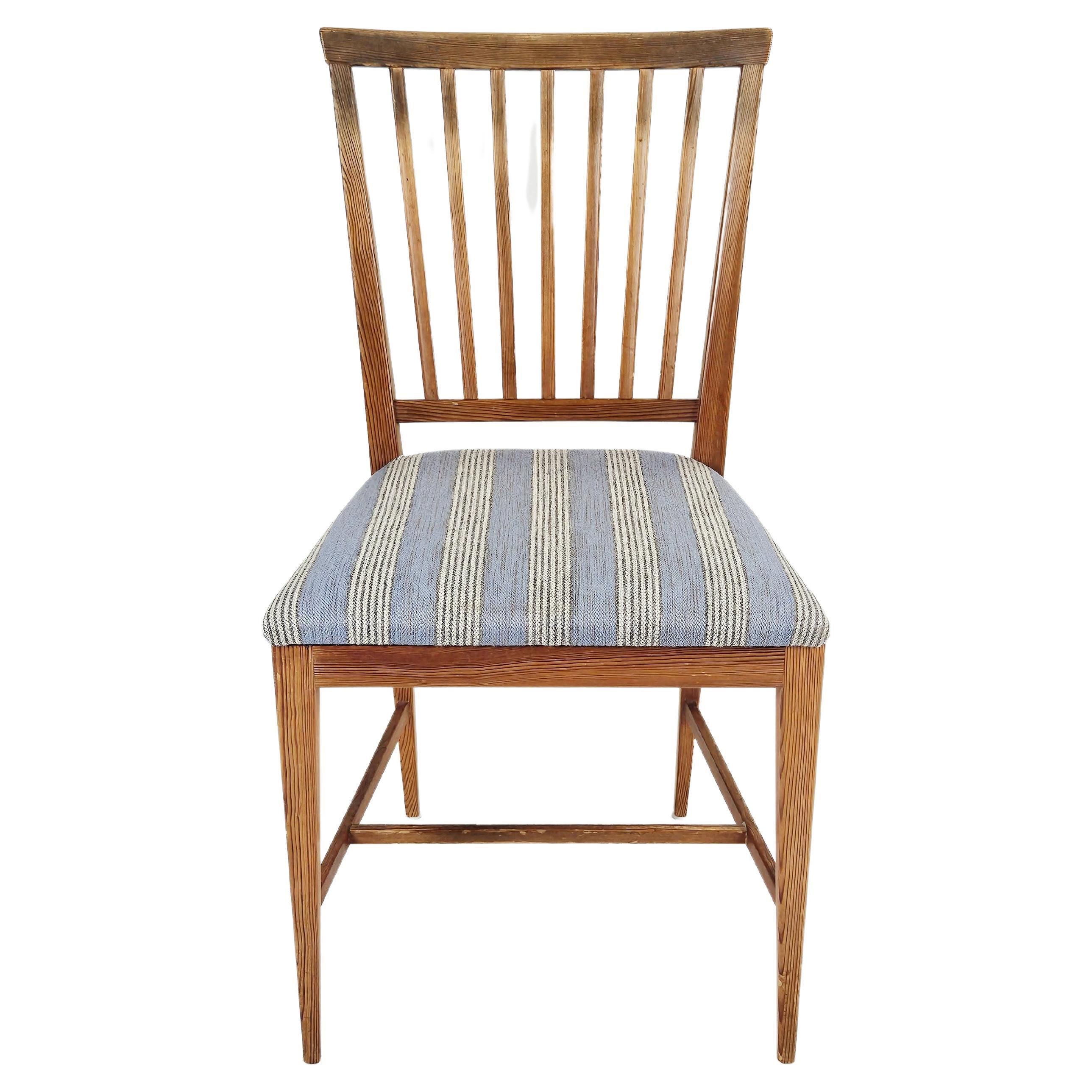 Set of four Swedish midcentury pine dining chairs by Carl Malmsten For Sale
