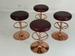 Set of Four Swivel Stools, Copper-Plated Metal with Oxblood Leather, American