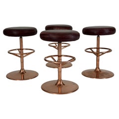 Set of Four Swivel Stools, Copper-Plated Metal with Oxblood Leather, American