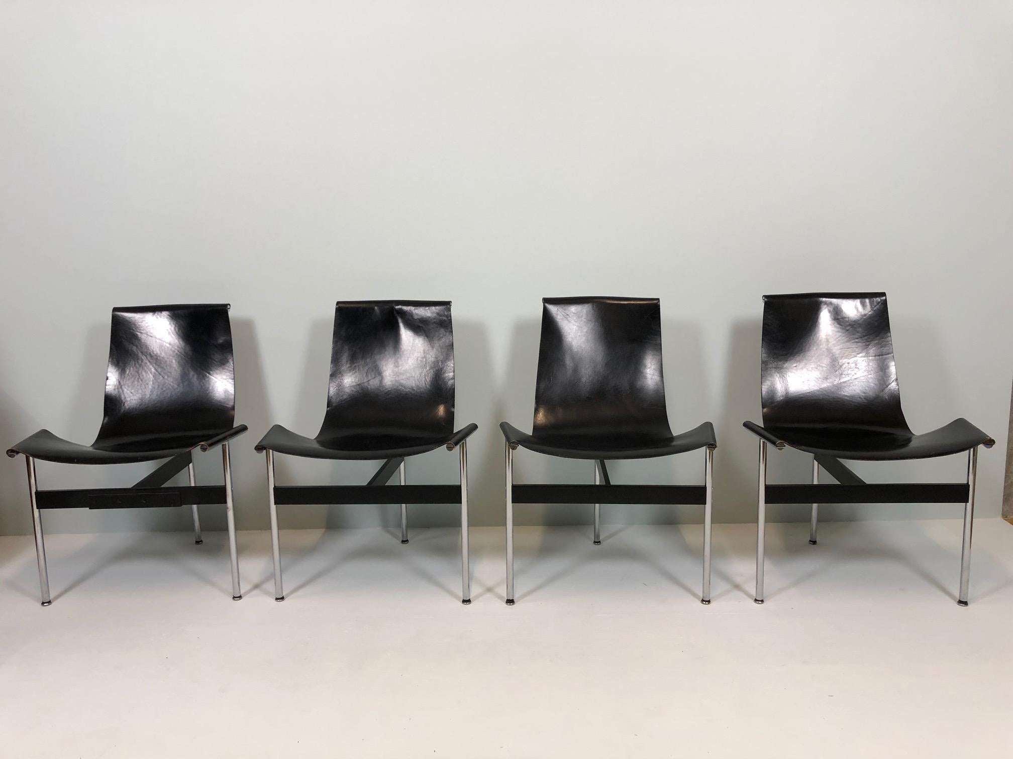 Set of four T-chairs designed in 1952 by William Katavolos, Douglas Kelly & Ross Littel. These examples were made by ICF.

Chromed and enameled steel T frames supporting black leather slings. A very elegant and comfortable set of dining