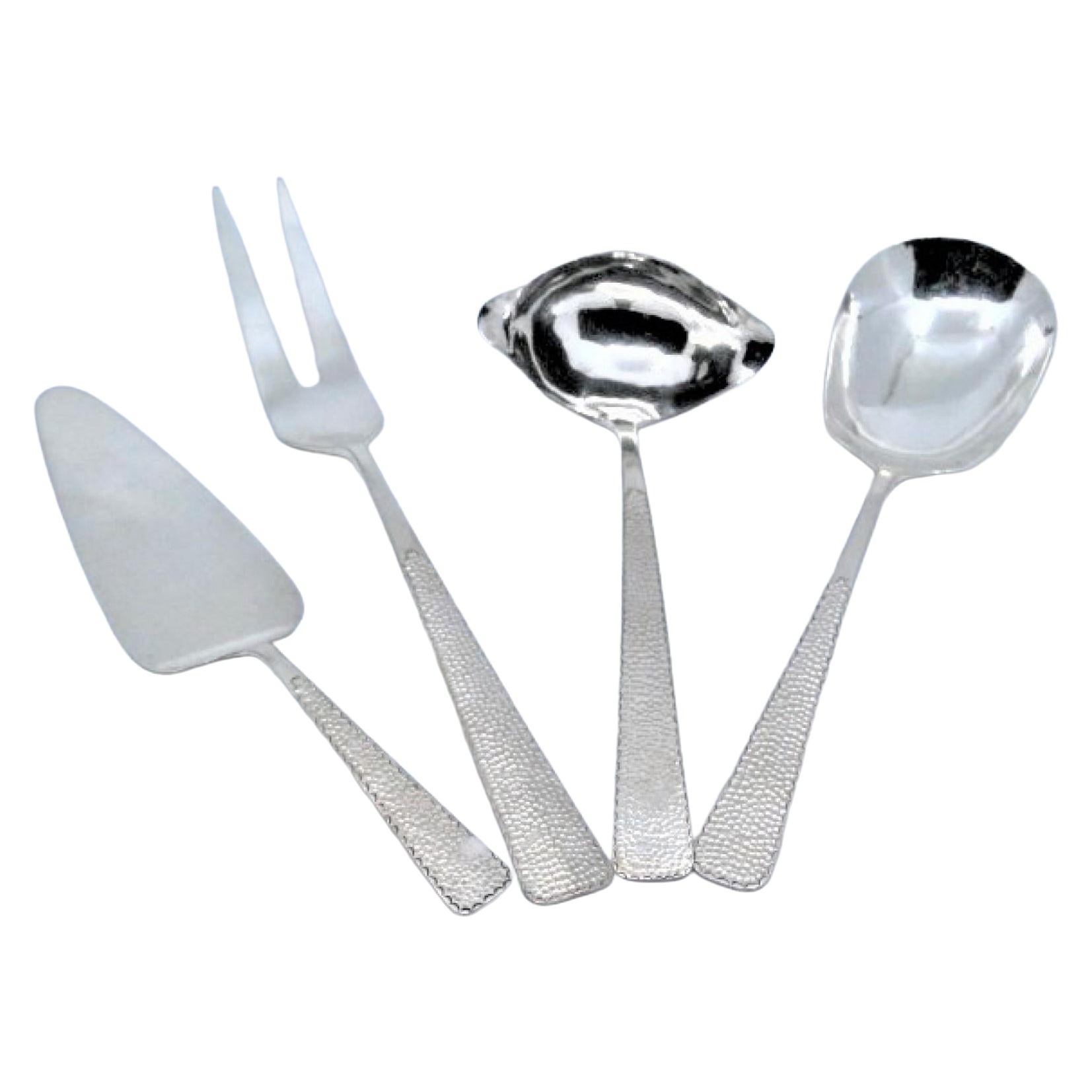Set of four table cutlery in hammered silver handles in vendita