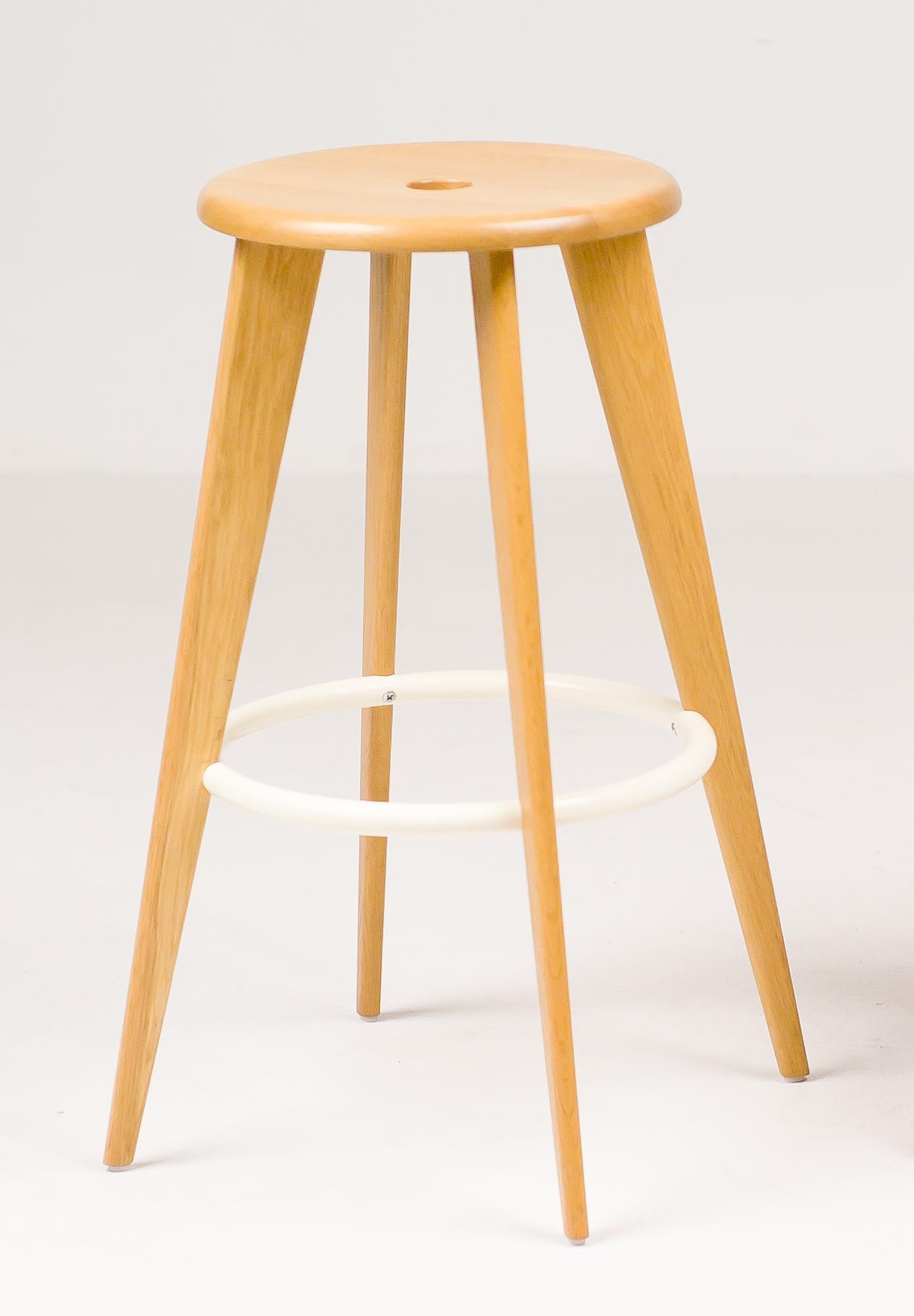 The Tabouret Haut bar stool designed by Jean Prouvé and made by Vitra is based on the basic shape of the Classic bar stool. Crafted from oak conform the Classic Tabouret Haut. Natural oak, off-white enameled steel ring.
Marked with label, priced