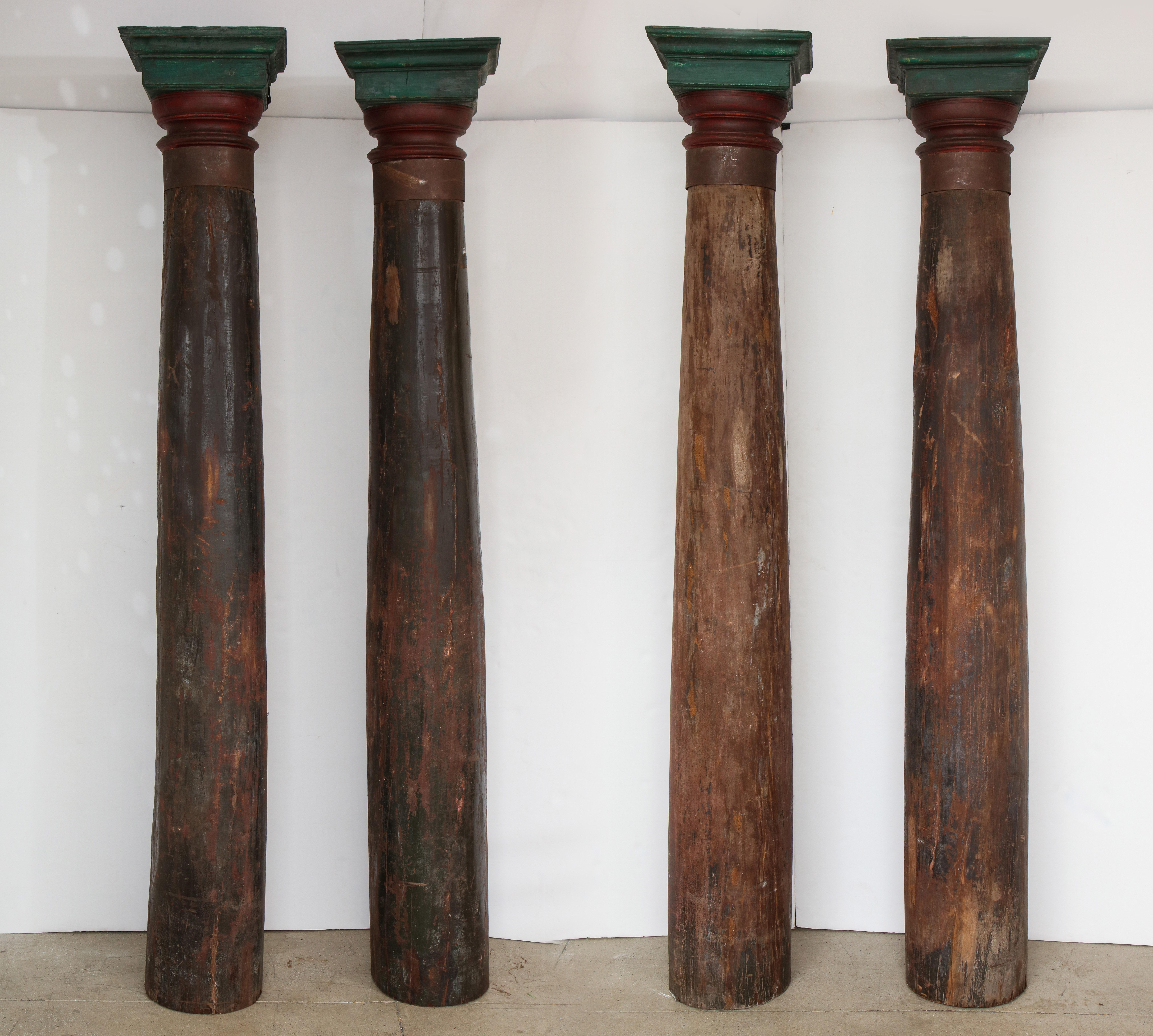 Set of four 8 foot teak pillars with original paint