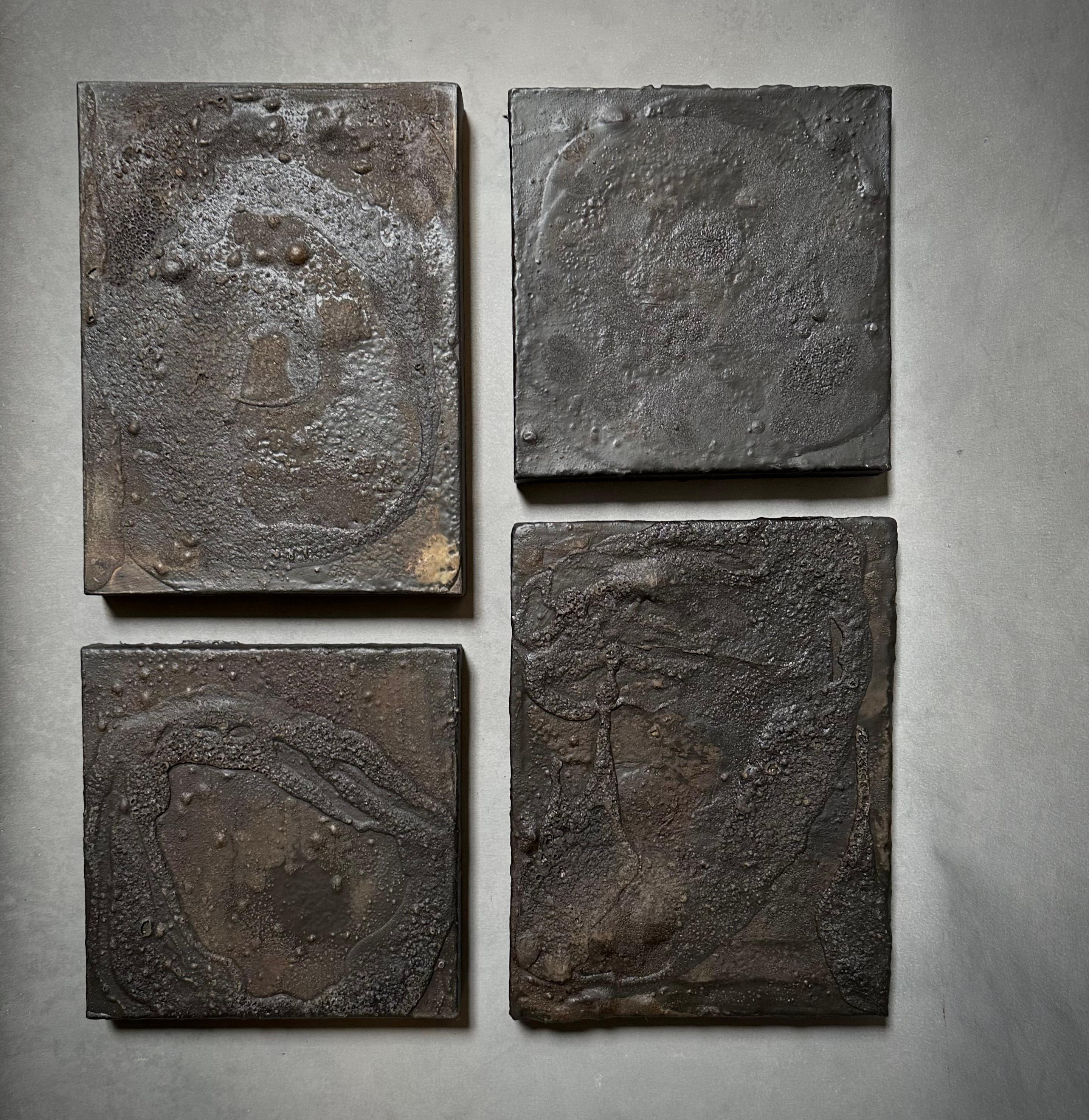 Set of four tar paintings by contemporary Dutch artist Carine Despriet. Earthy and elemental with a dynamic mineral quality and unique surface abstraction. May be displayed a variety of ways for multiple effects. 

Netherlands,
