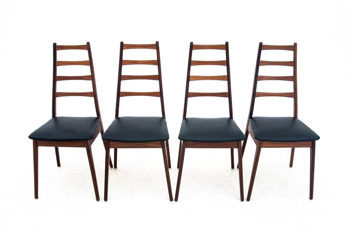 Chairs from Denmark, around 1960.
Made of teak wood. New upholstery - black Italian natural leather.
After wood renovation.
Excellent condition.
Dimensions: height 98 cm / height of the seat 46 cm / width 43 cm / depth 47 cm.
 
  
