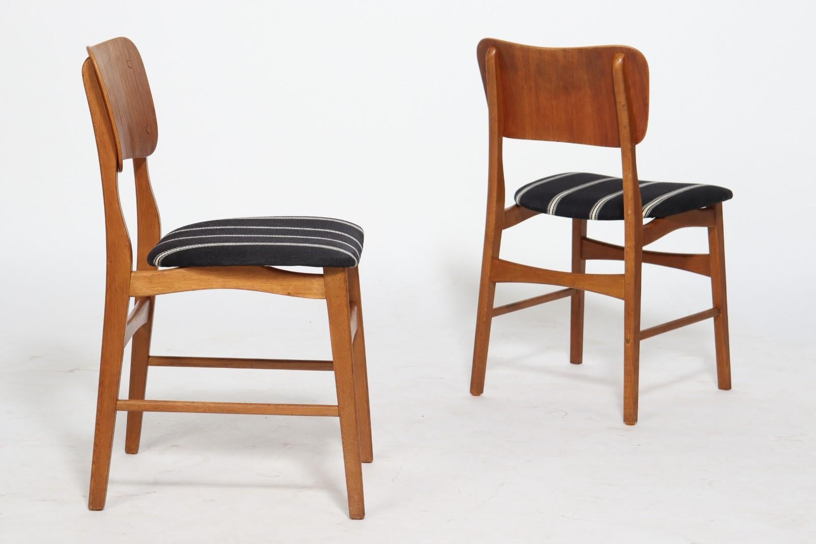 Danois Ensemble de quatre chaises de salle à manger en teck par Ib Kofod-Larsen pour Christensen & Larsen en vente