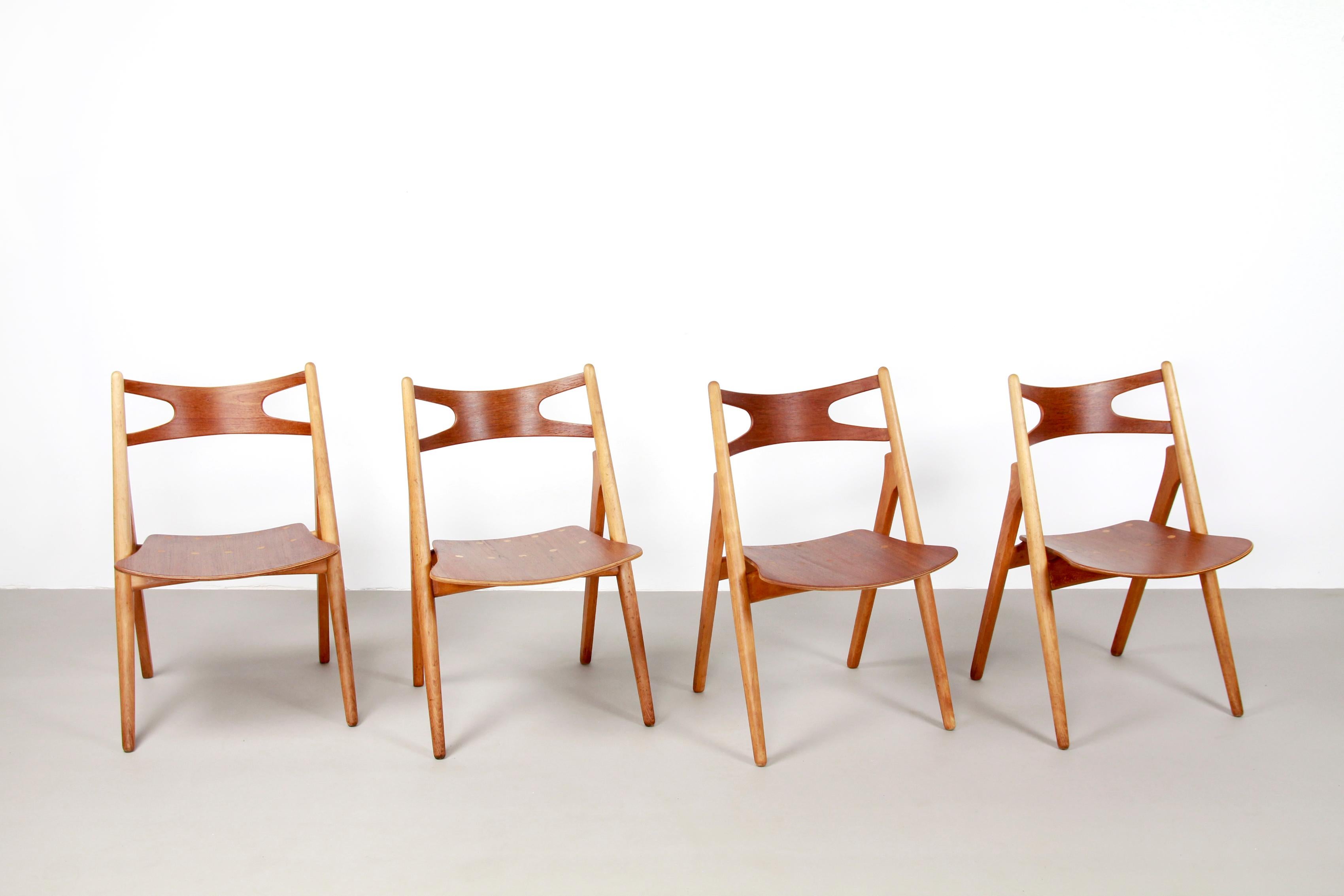 Danish Set of Four Teak Hans J Wegner Sawbuck Model CH29 Chairs by Carl Hansen