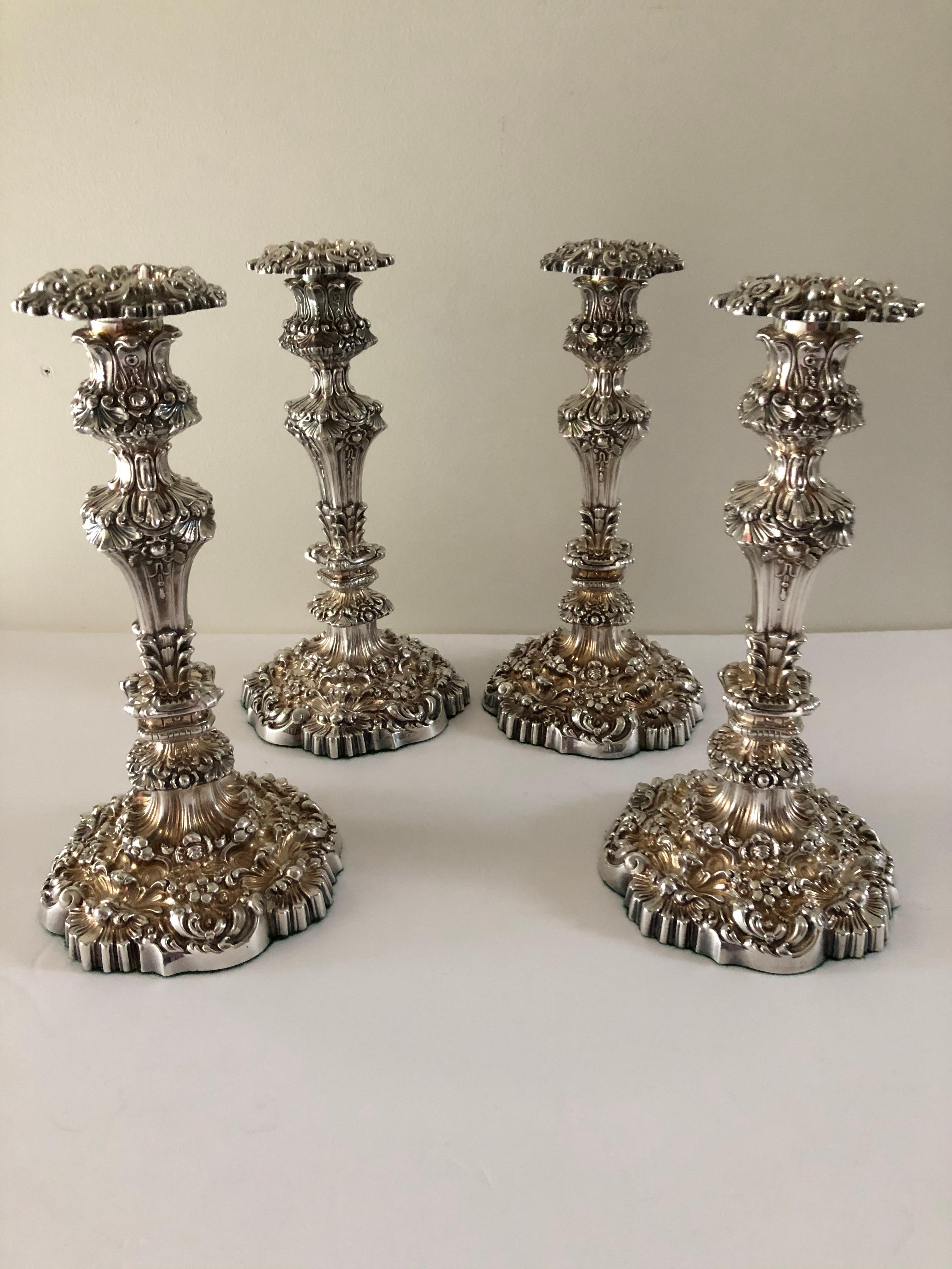Polished Set of Four Thomas Bradbury Antique Sheffield Rococo Repousse Candlesticks