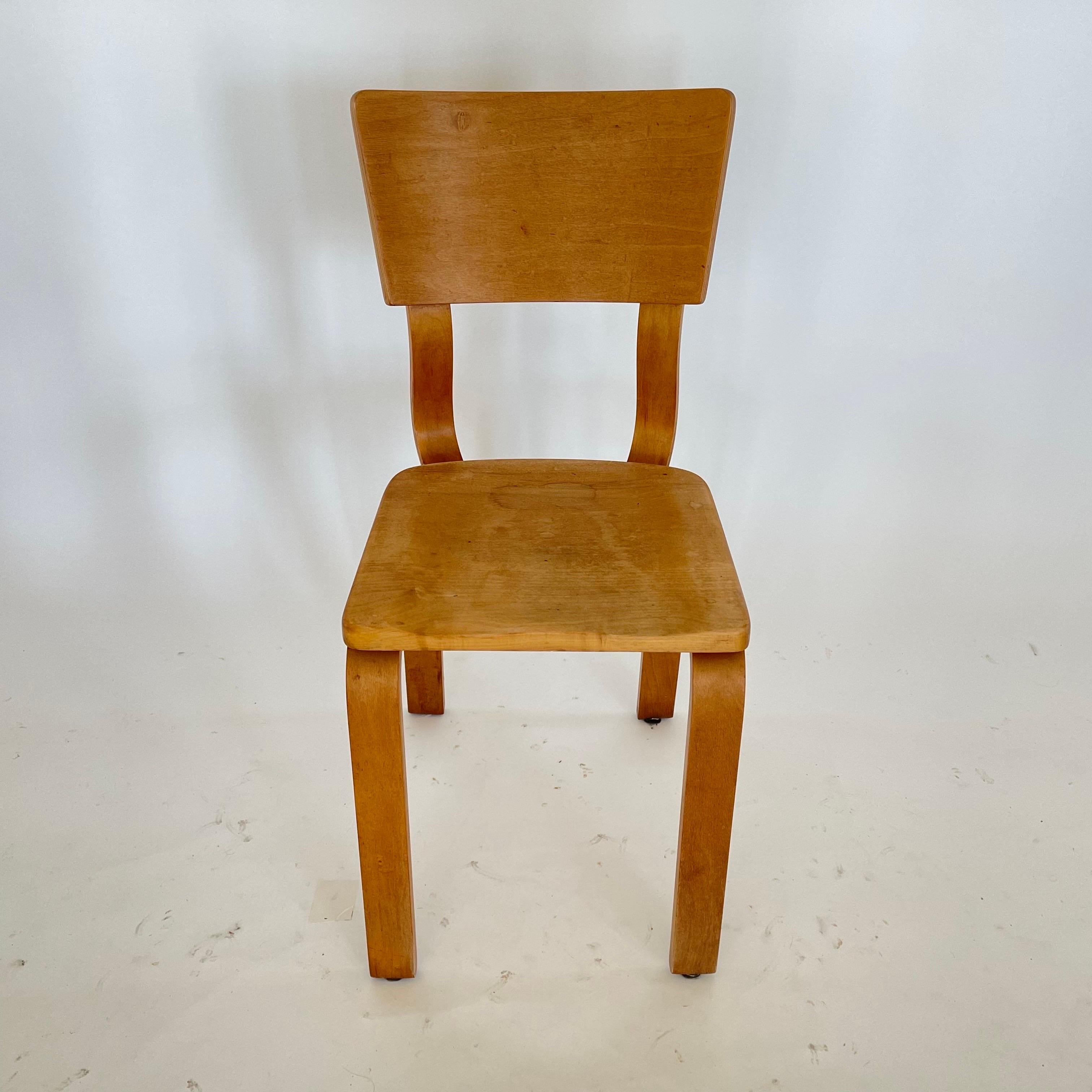 Mid-Century Modern Set of Four Thonet 1216-S17-B1 Bent Plywood Saddle Seat Dining Chairs, 1940s
