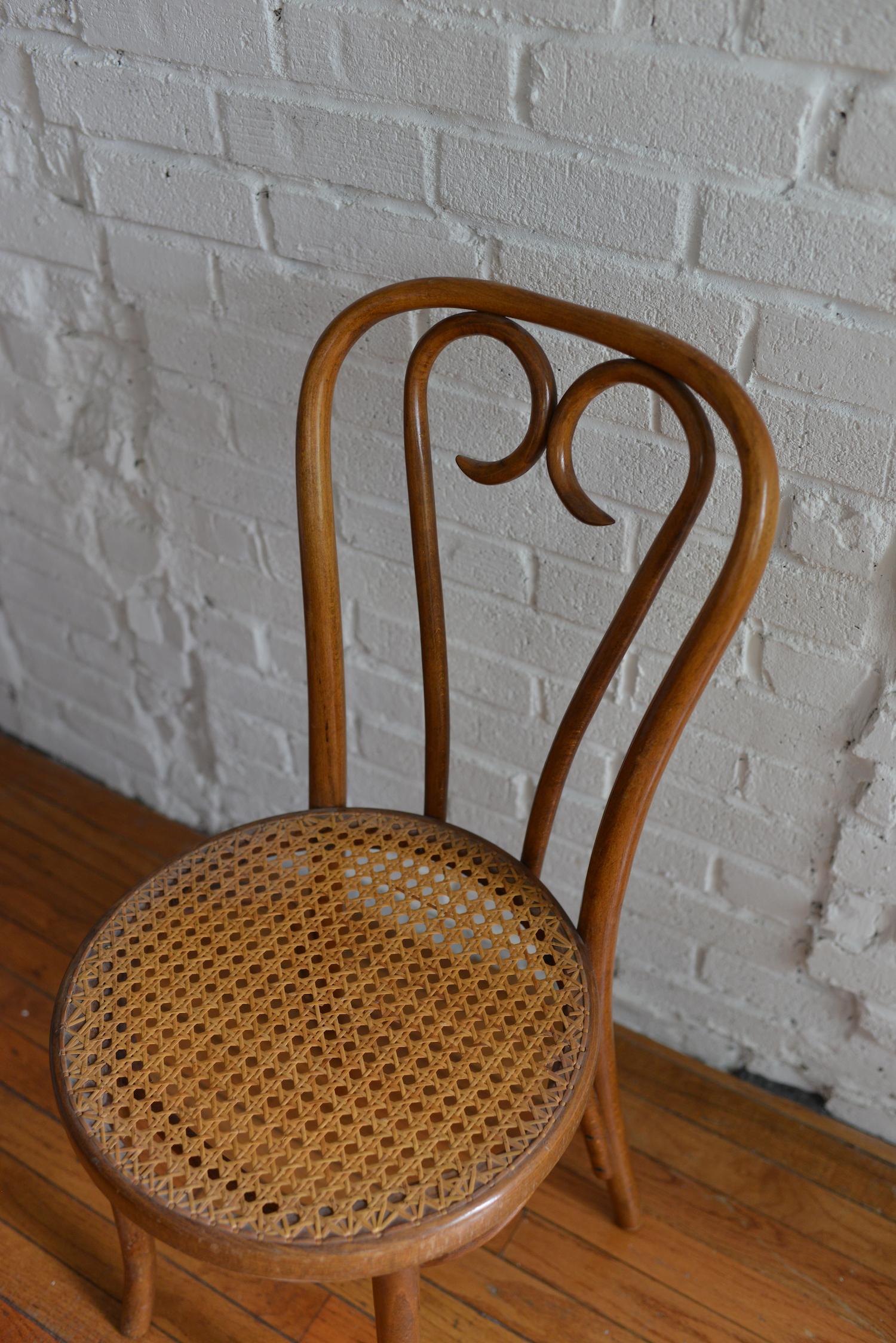 Mid-20th Century Set of Four Thonet Bentwood and Cane No. 16 Sweetheart Chairs