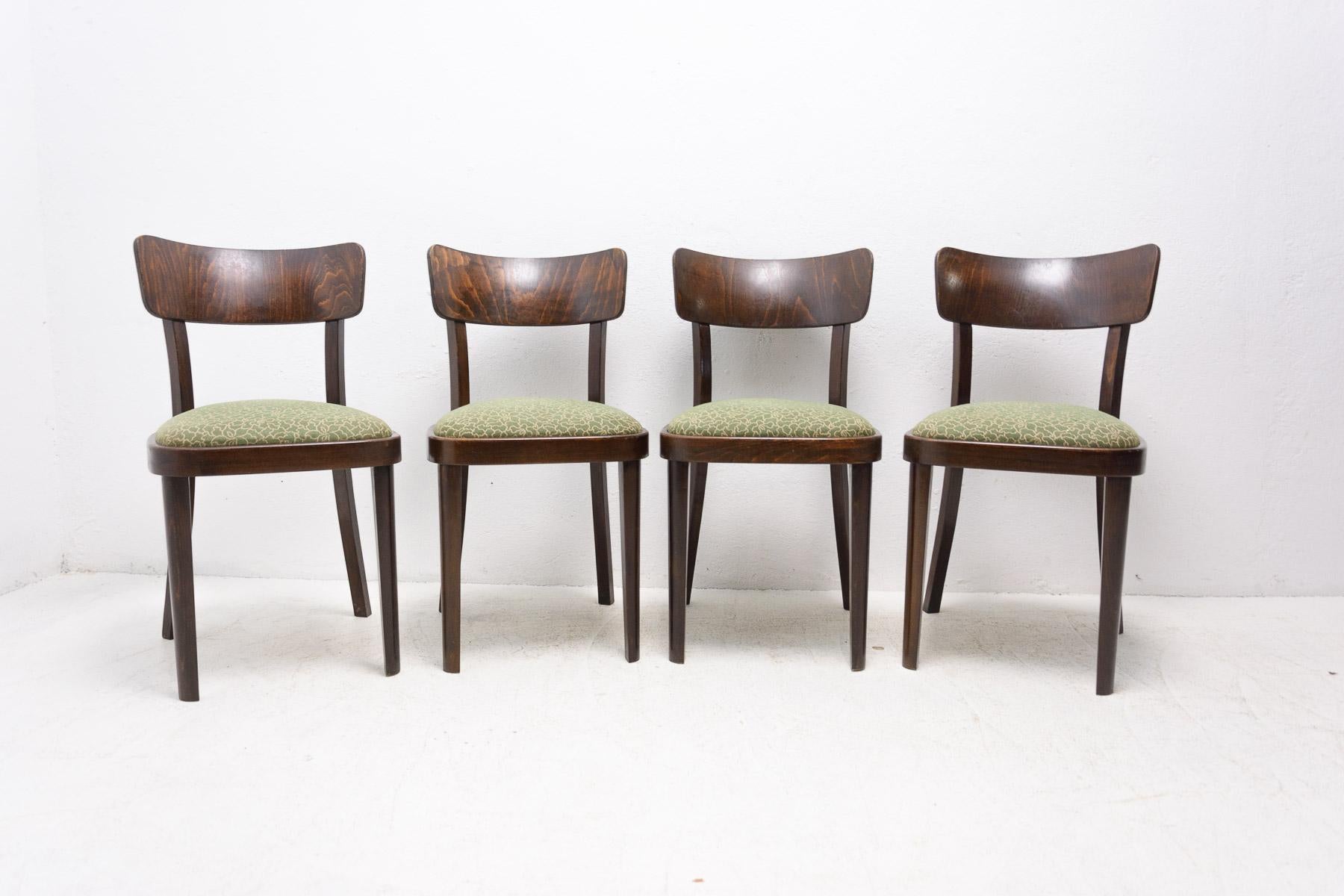 Dining chairs Thonet, made in Czechoslovakia 1950´s. Walnut veneer, upholstered seats. In very good Vintage condition, with wear appropriate for the age of chairs. Price is for the set of four.

Measures: Height: 82 cm

Seat: 44 × 42 cm

Seat