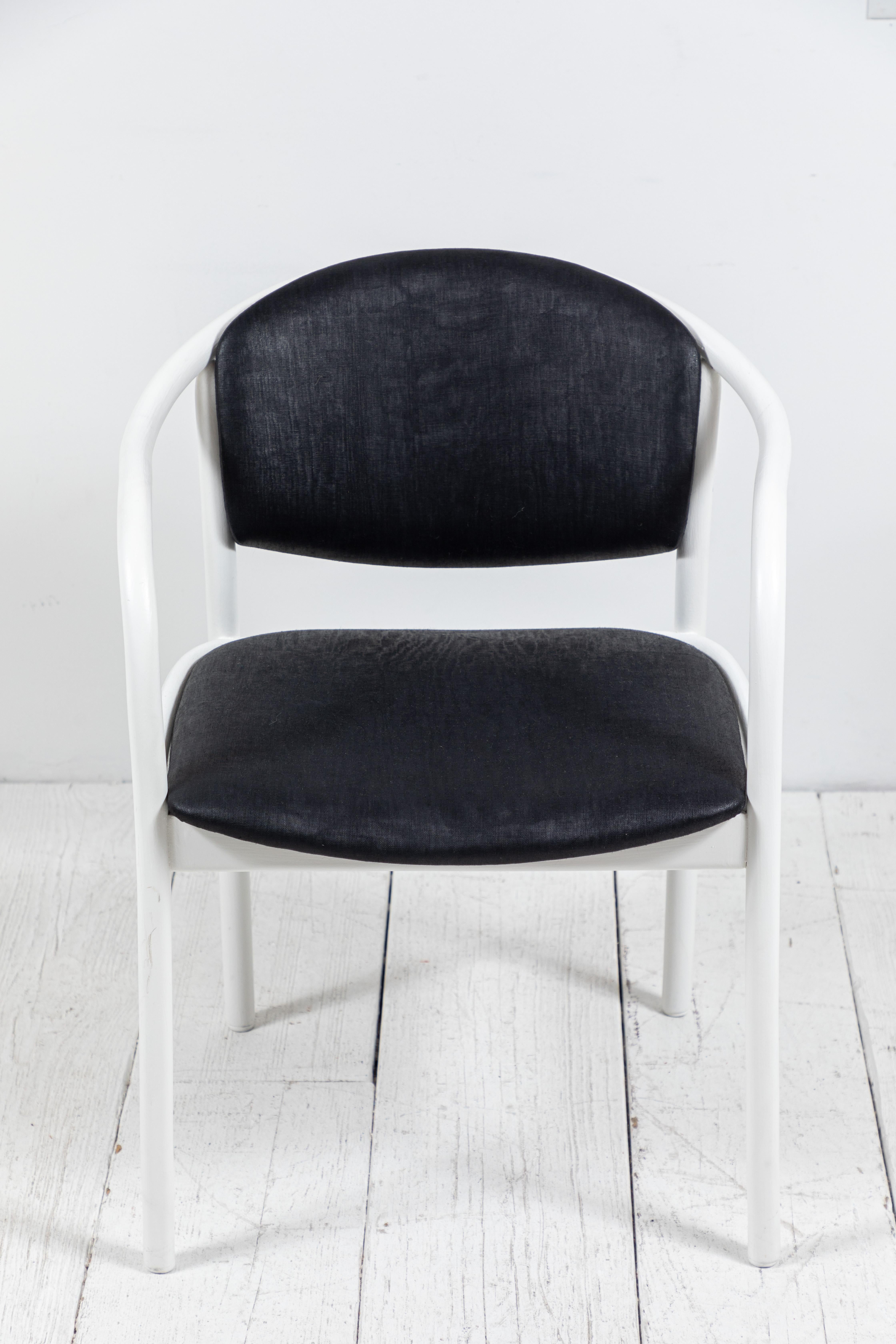 Set of four Thonet dining chairs newly painted white and upholstered in a black beetled linen from British fabric company, 36 Bourne Street.