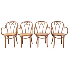 Set of Four Thonet Style Bentwood and Cane Armchairs