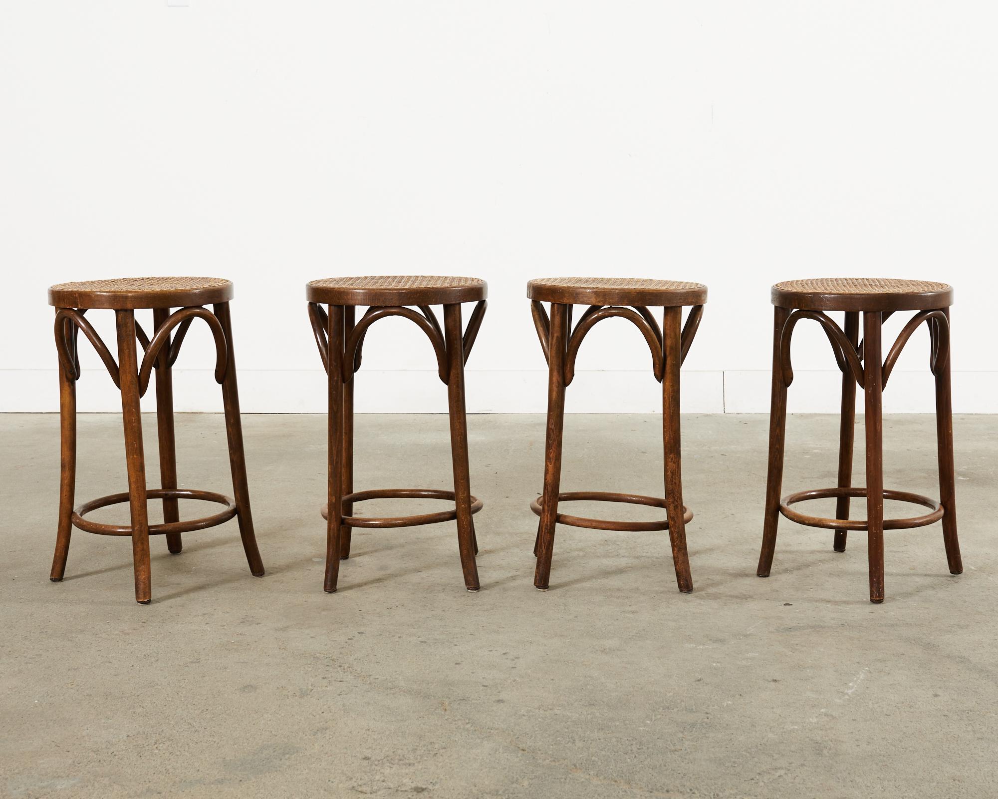 20th Century Set of Four Thonet Style Bentwood Cane Seat Barstools