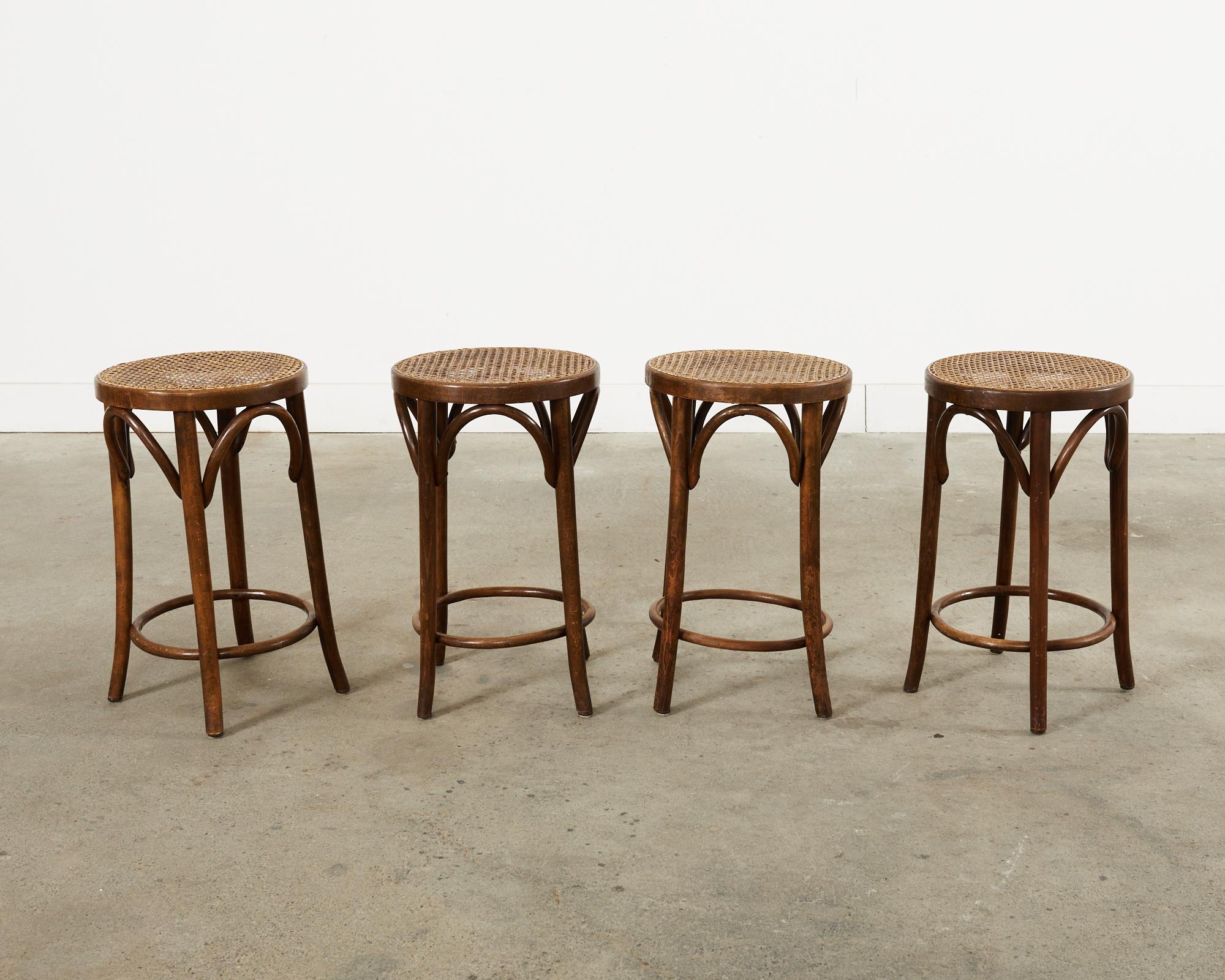 Set of Four Thonet Style Bentwood Cane Seat Barstools 1