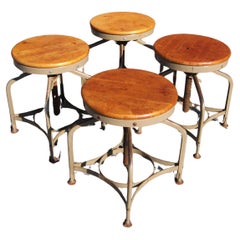 Set of Four Toledo Industrial Adjustable Height Swivel Stools, Circa 1940