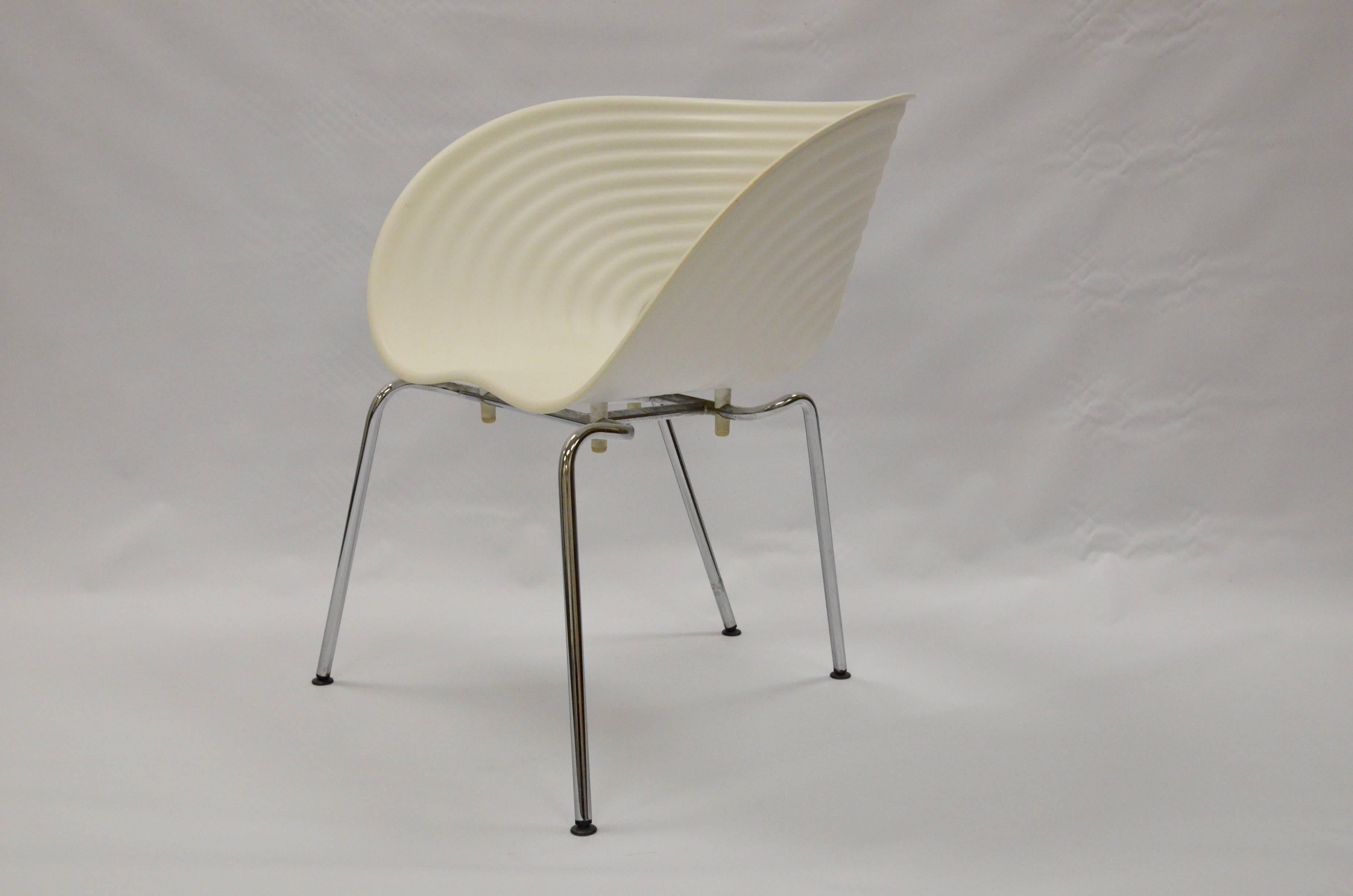 A set of four vintage Tom Vac chairs designed by Ron Arad. The Tom Vac chair features a ribbed plastic shell with a hole in the base, which allows it to be stacked. Chrome legs. 

Originally designed in aluminum by Ron Arad for an installation for