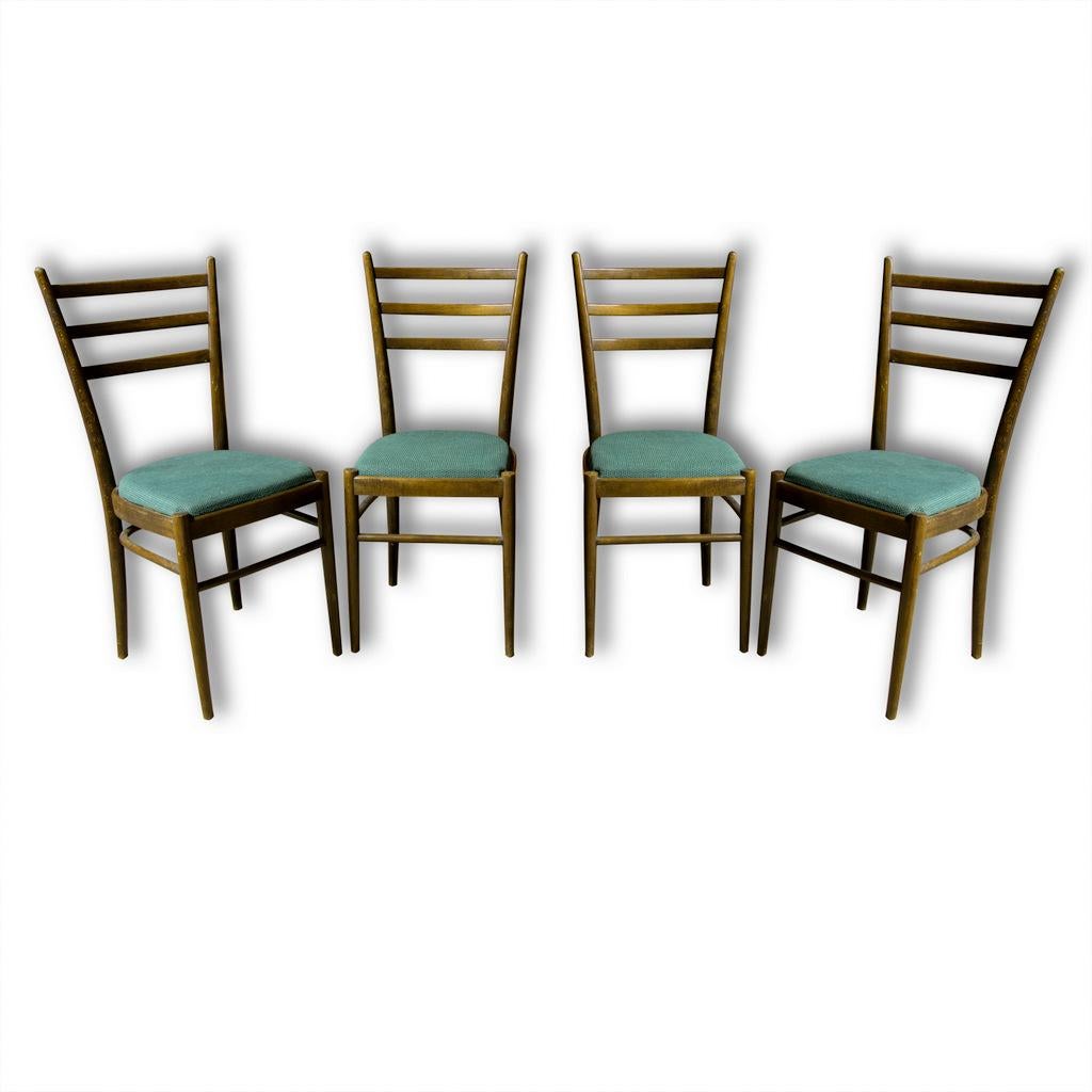 Lovely dining chairs Ton, made in Czechoslovakia, 1960s. Beechwood, green fabric. In very good Vintage condition, without any damage. Price is for the set of four.
 
  